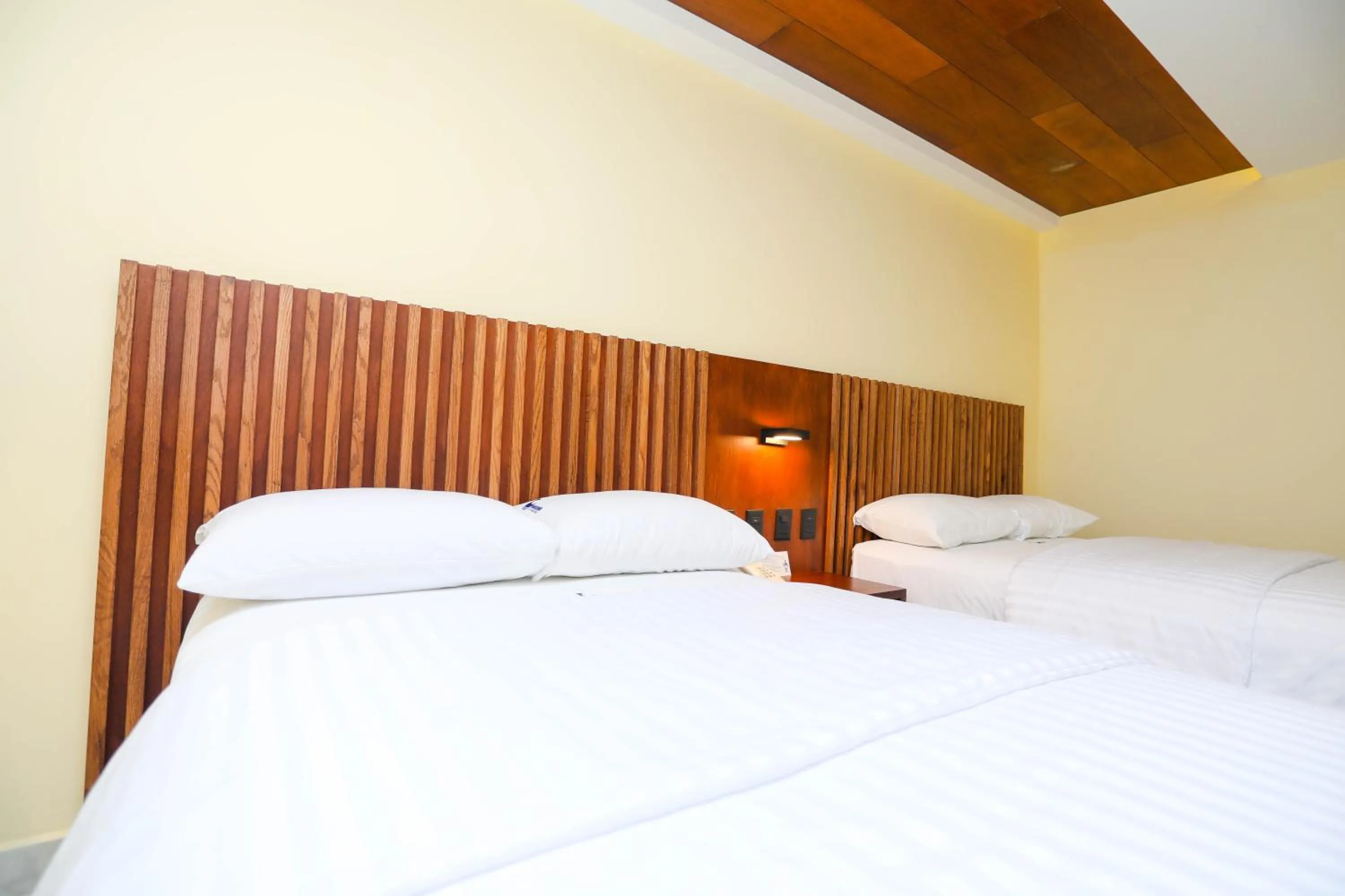 Bed in Hotel Parador