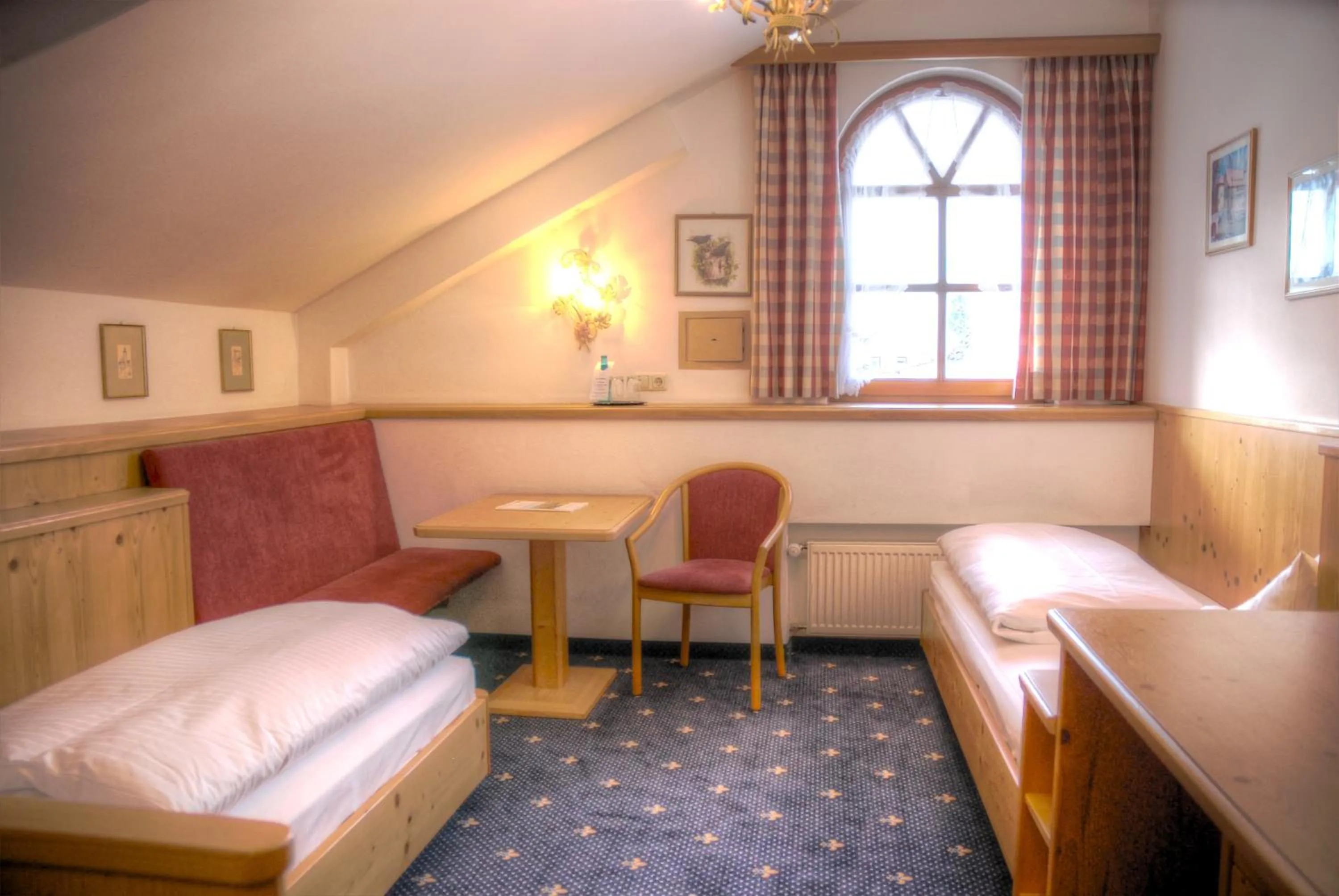 Photo of the whole room, Bed in Hotel Hölzer Bräu by Lehmann Hotels