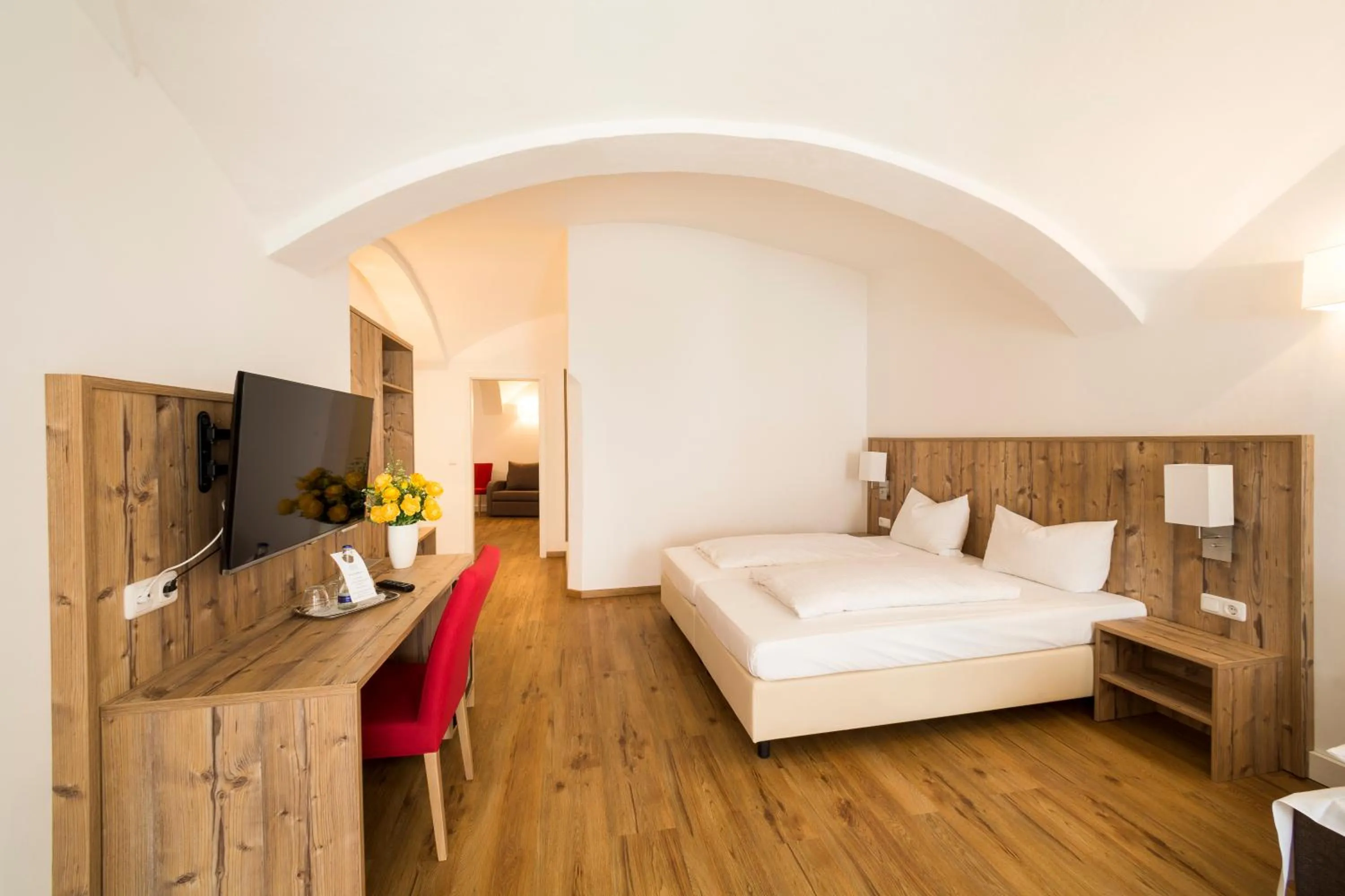 Photo of the whole room, Bed in Hotel Hölzer Bräu by Lehmann Hotels