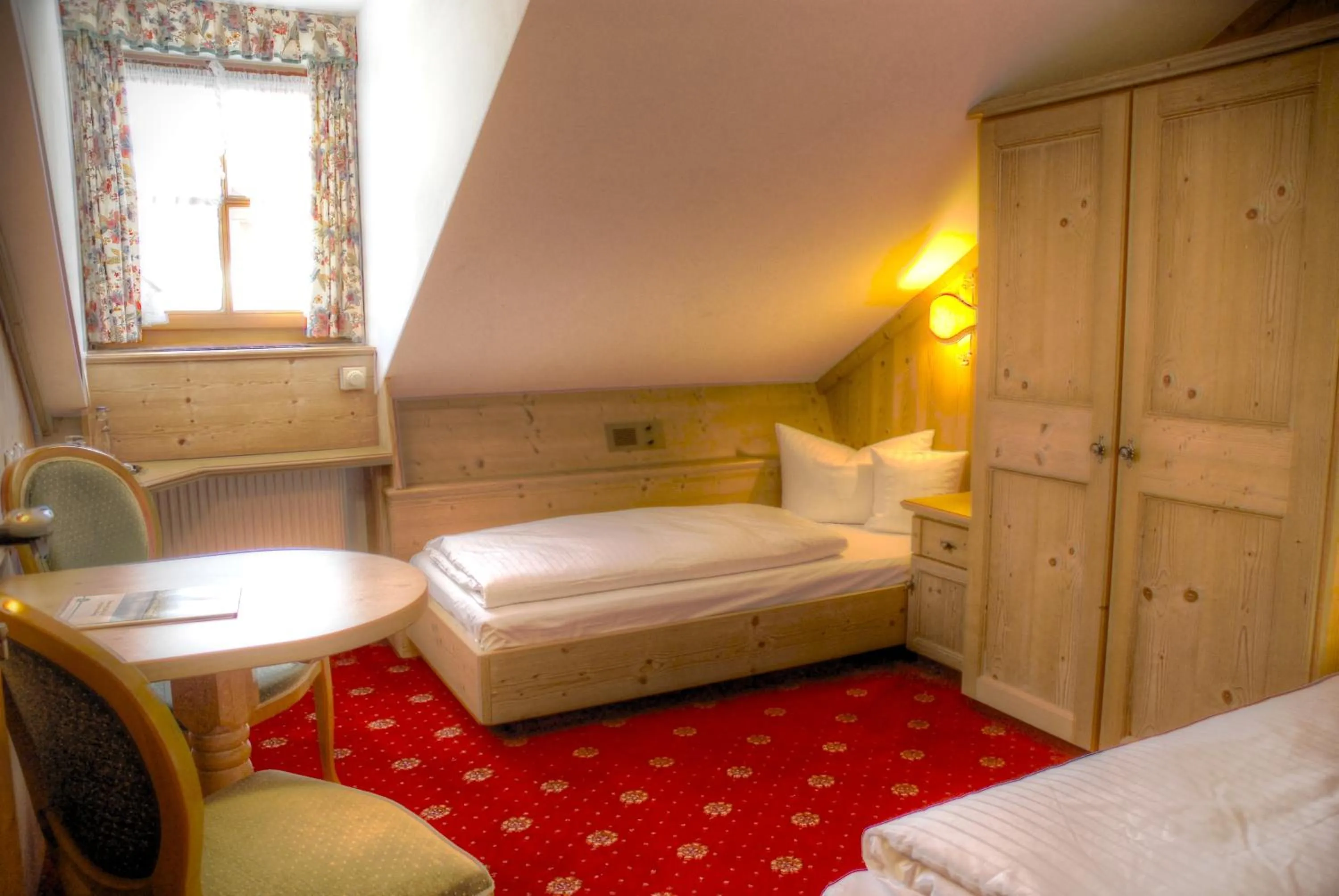 Photo of the whole room, Bed in Hotel Hölzer Bräu by Lehmann Hotels