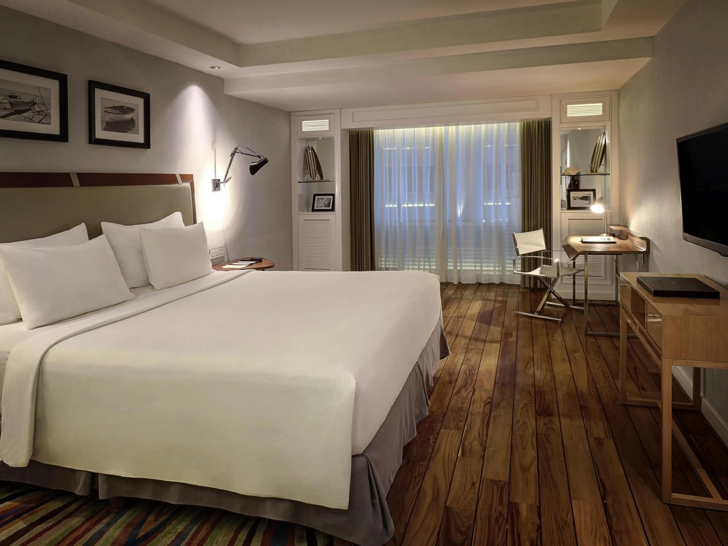 Bedroom, Bed in The Kuta Beach Heritage Hotel - Managed by Accor