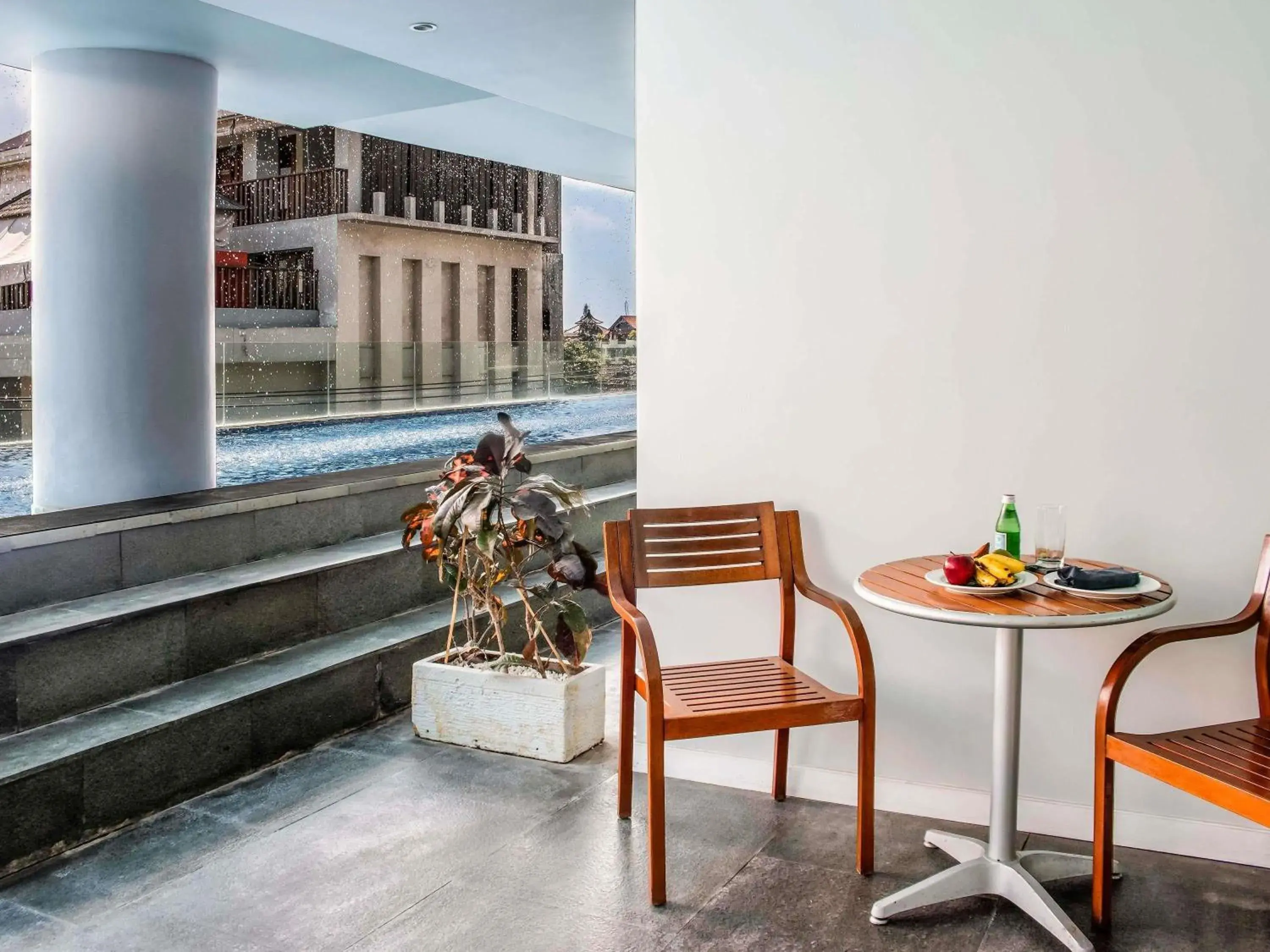 Pool view in The Kuta Beach Heritage Hotel - Managed by Accor Pool view in The Kuta Beach Heritage Hotel - Managed by Accor