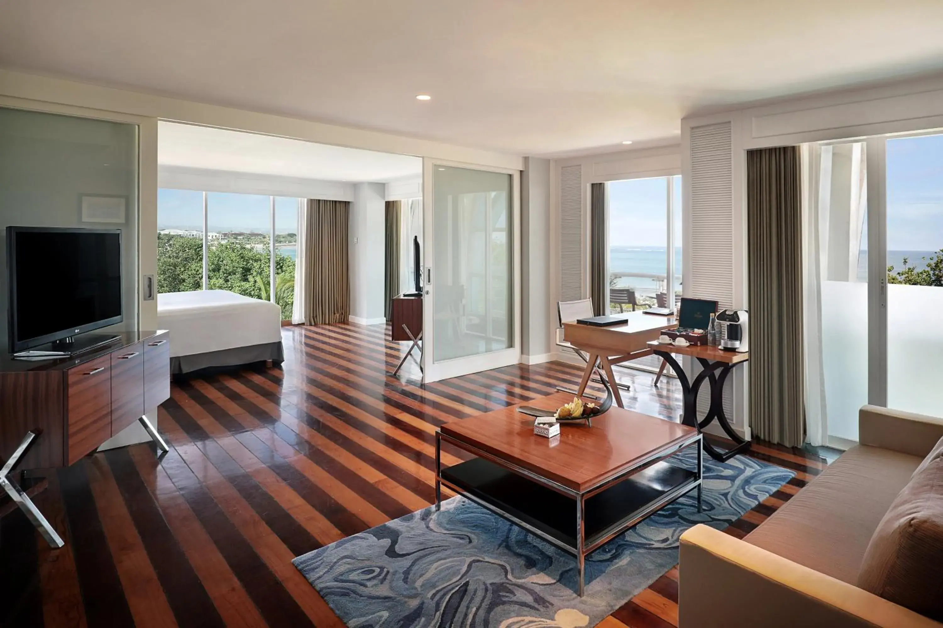 Living room, Bed in The Kuta Beach Heritage Hotel - Managed by Accor Living room, Bed in The Kuta Beach Heritage Hotel - Managed by Accor