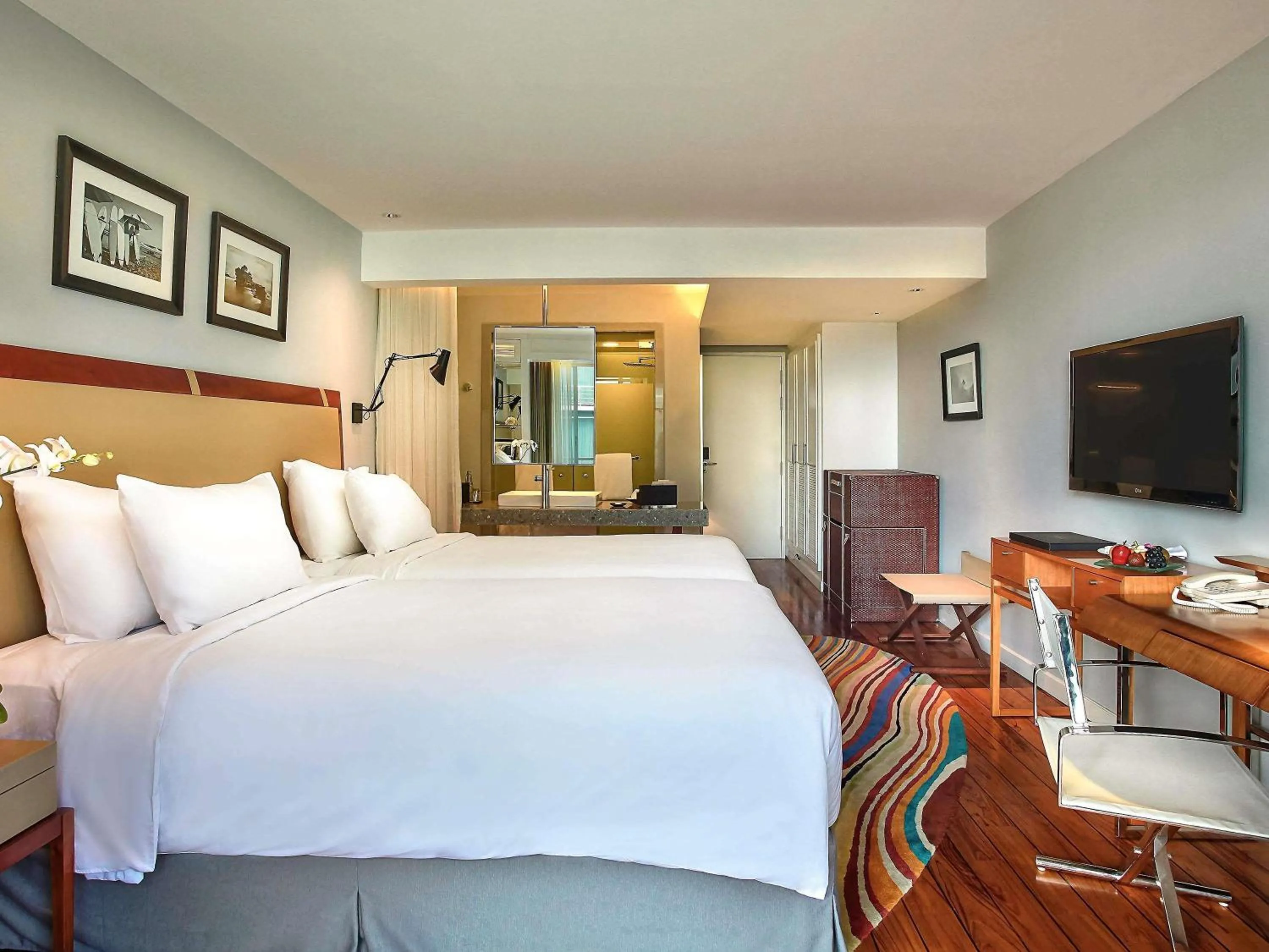 Bedroom, Bed in The Kuta Beach Heritage Hotel - Managed by Accor