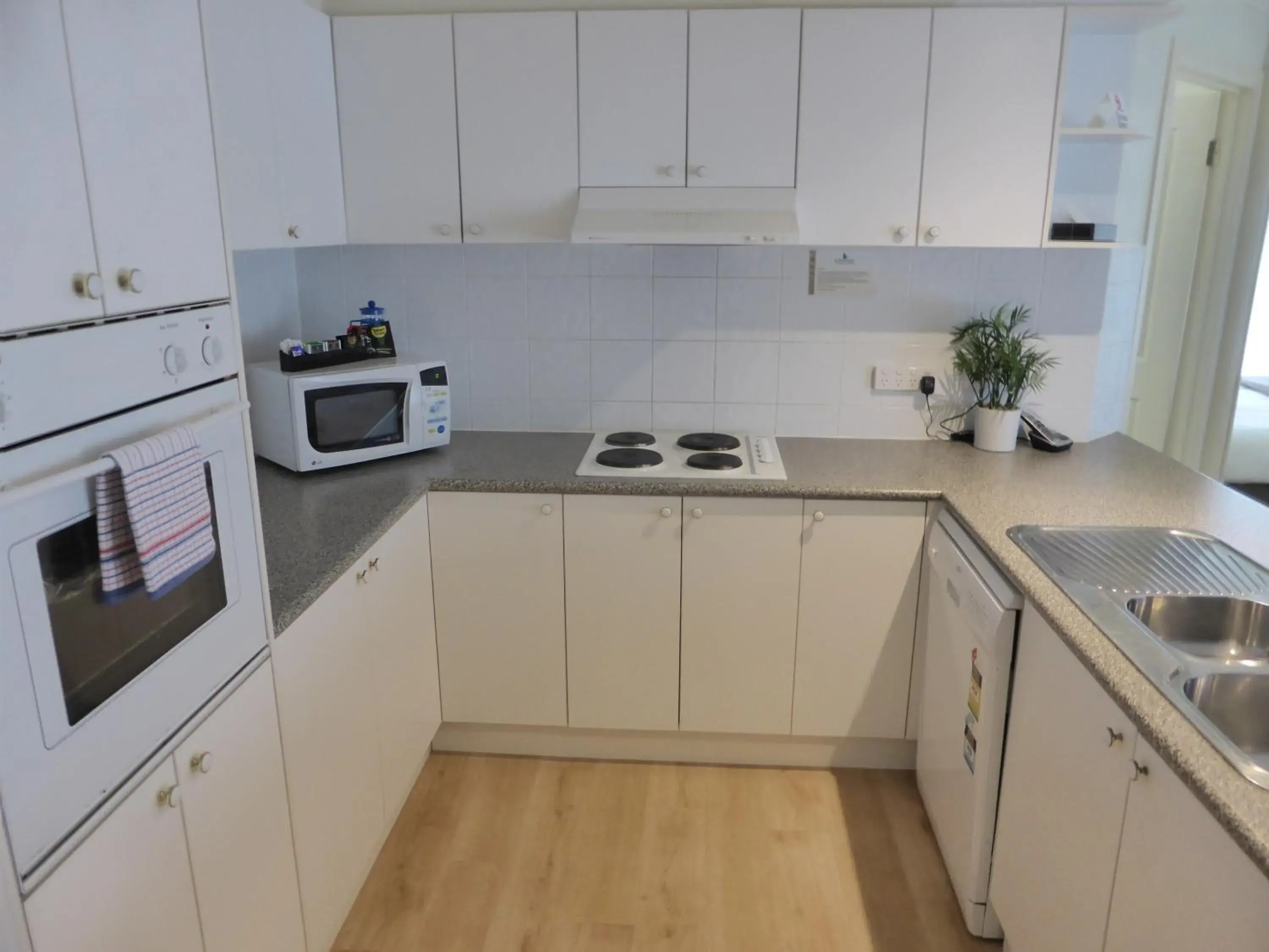Kitchen or kitchenette in Lifestyle Apartments at Ferntree Kitchen or kitchenette in Lifestyle Apartments at Ferntree