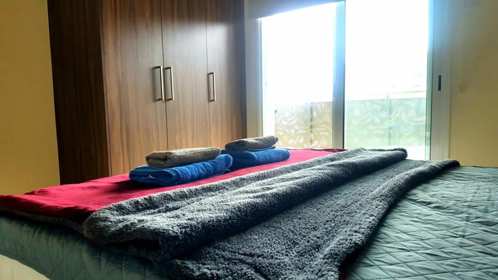 Bed in Mythical Sands Luxury Apartment