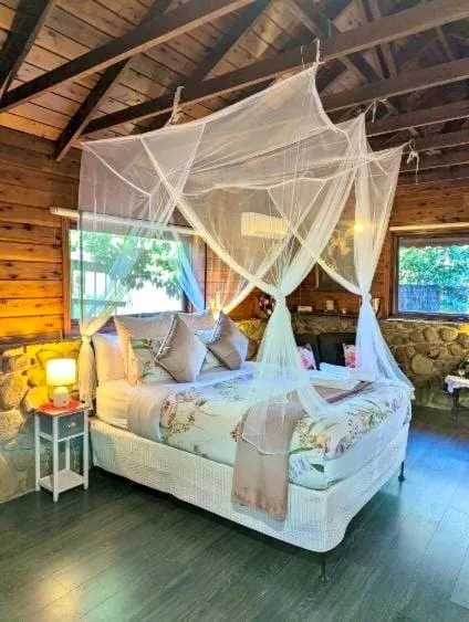 Bed in Forget Me Not Cottages