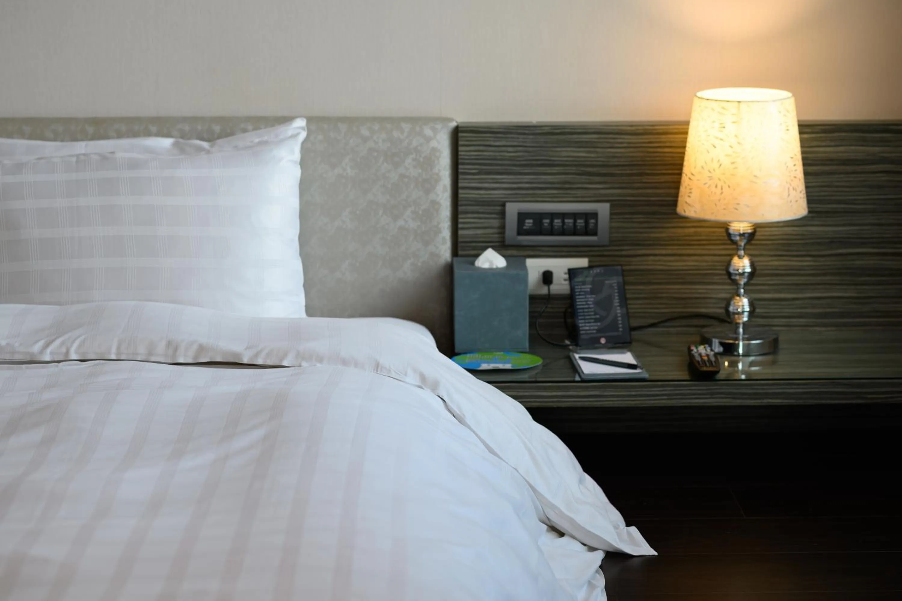 Bed in Hotel Geight Taipei