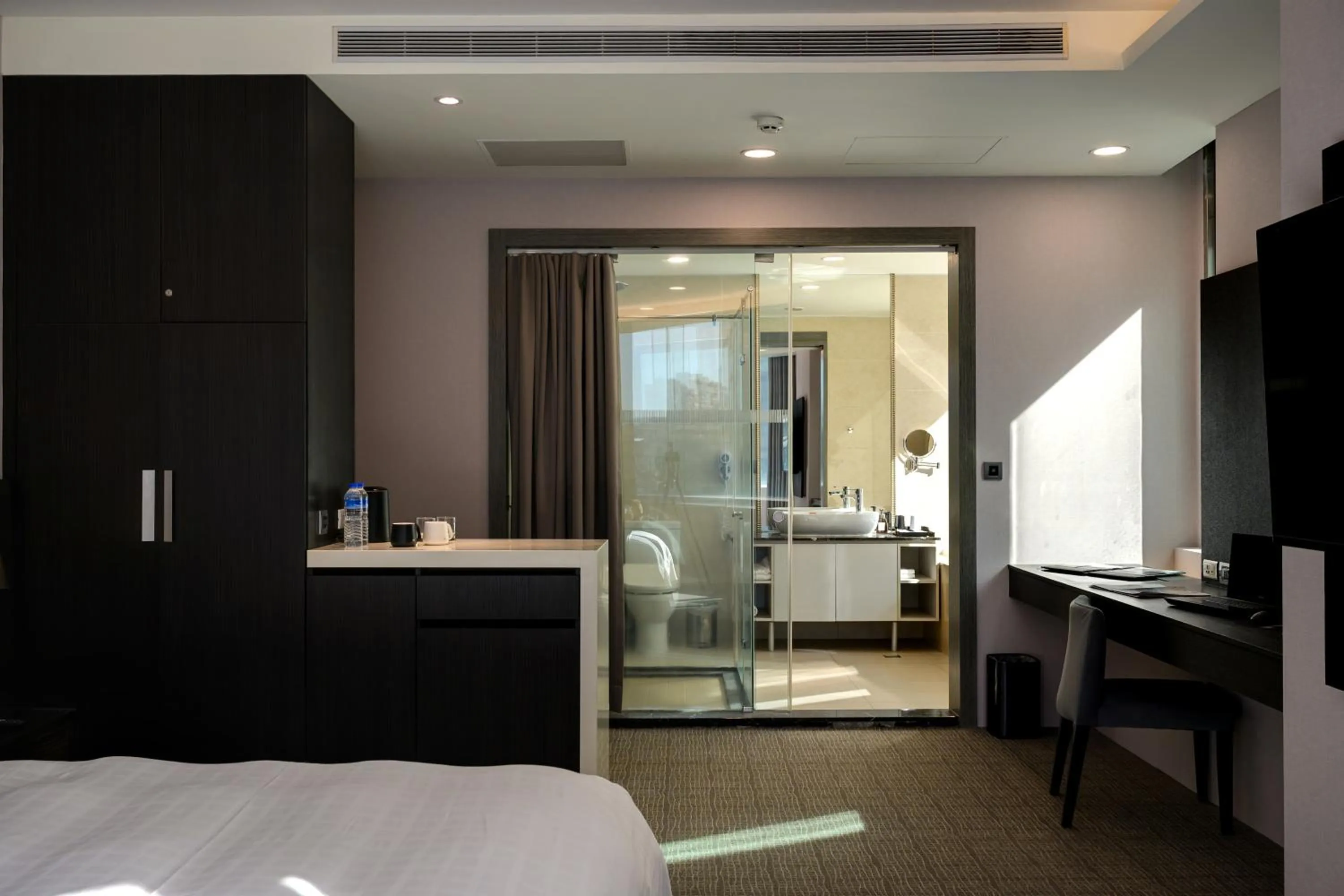 Bed in Hotel Geight Taipei