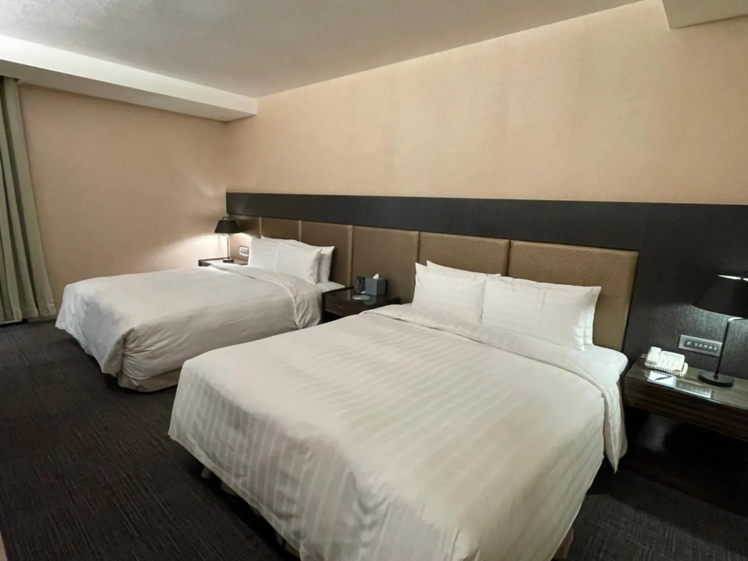 Bed in Hotel Geight Taipei