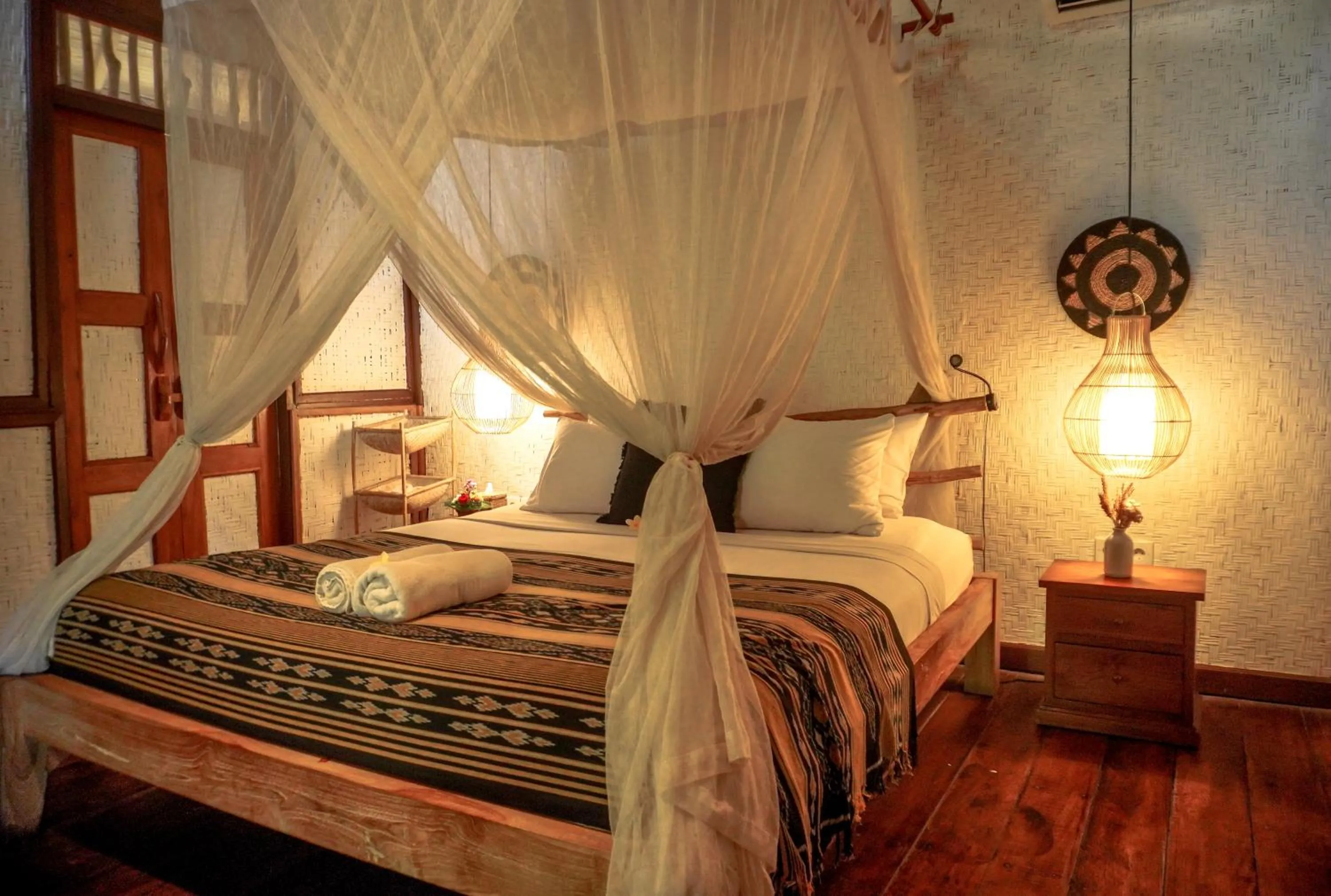 Bed in The Calmtree Bungalows