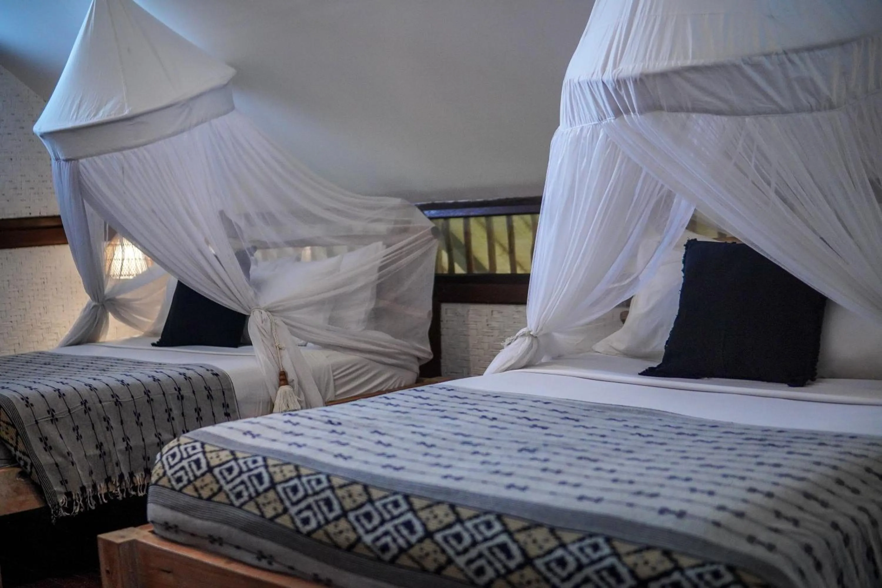 Bed in The Calmtree Bungalows