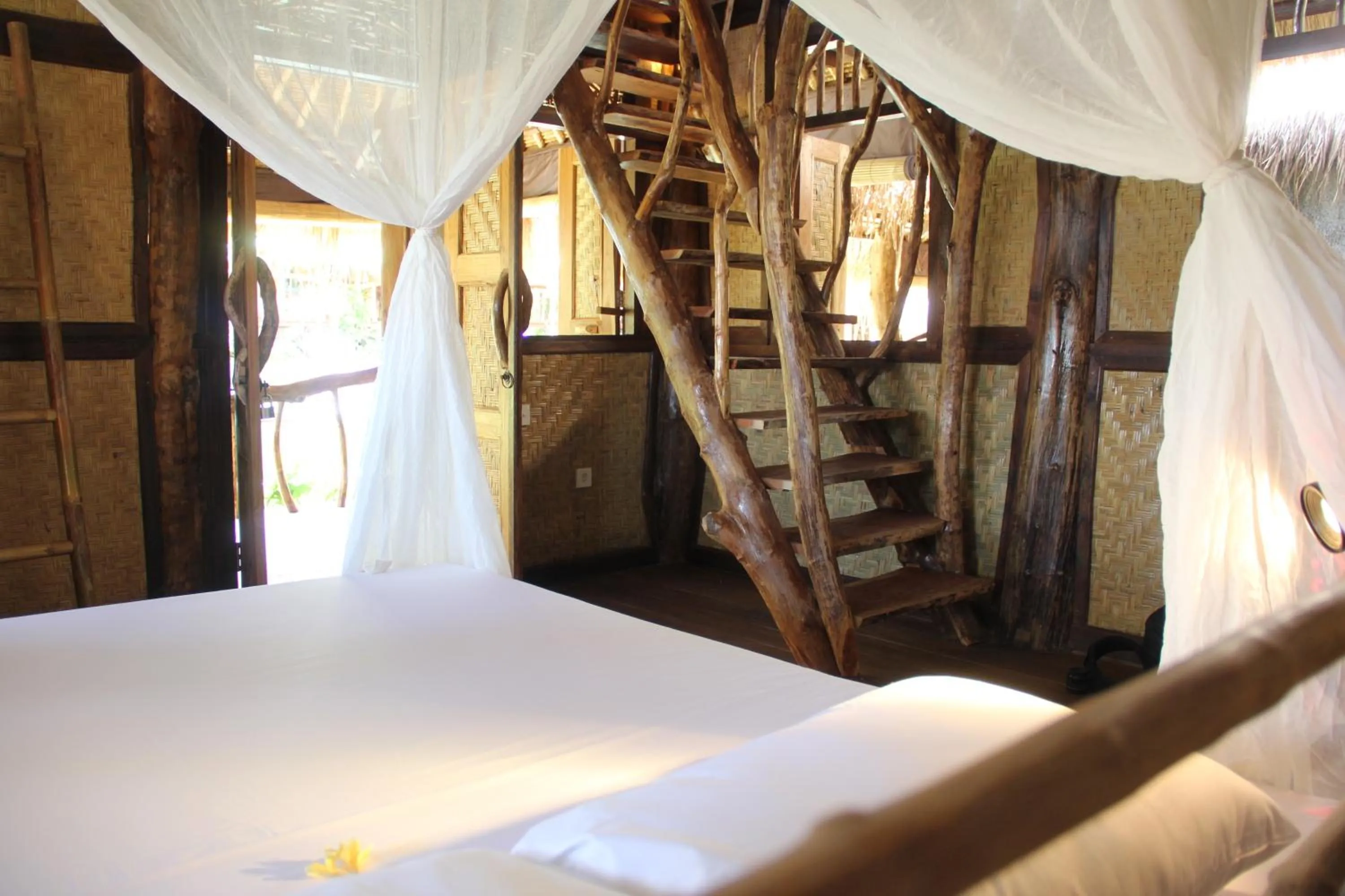 Bed in The Calmtree Bungalows