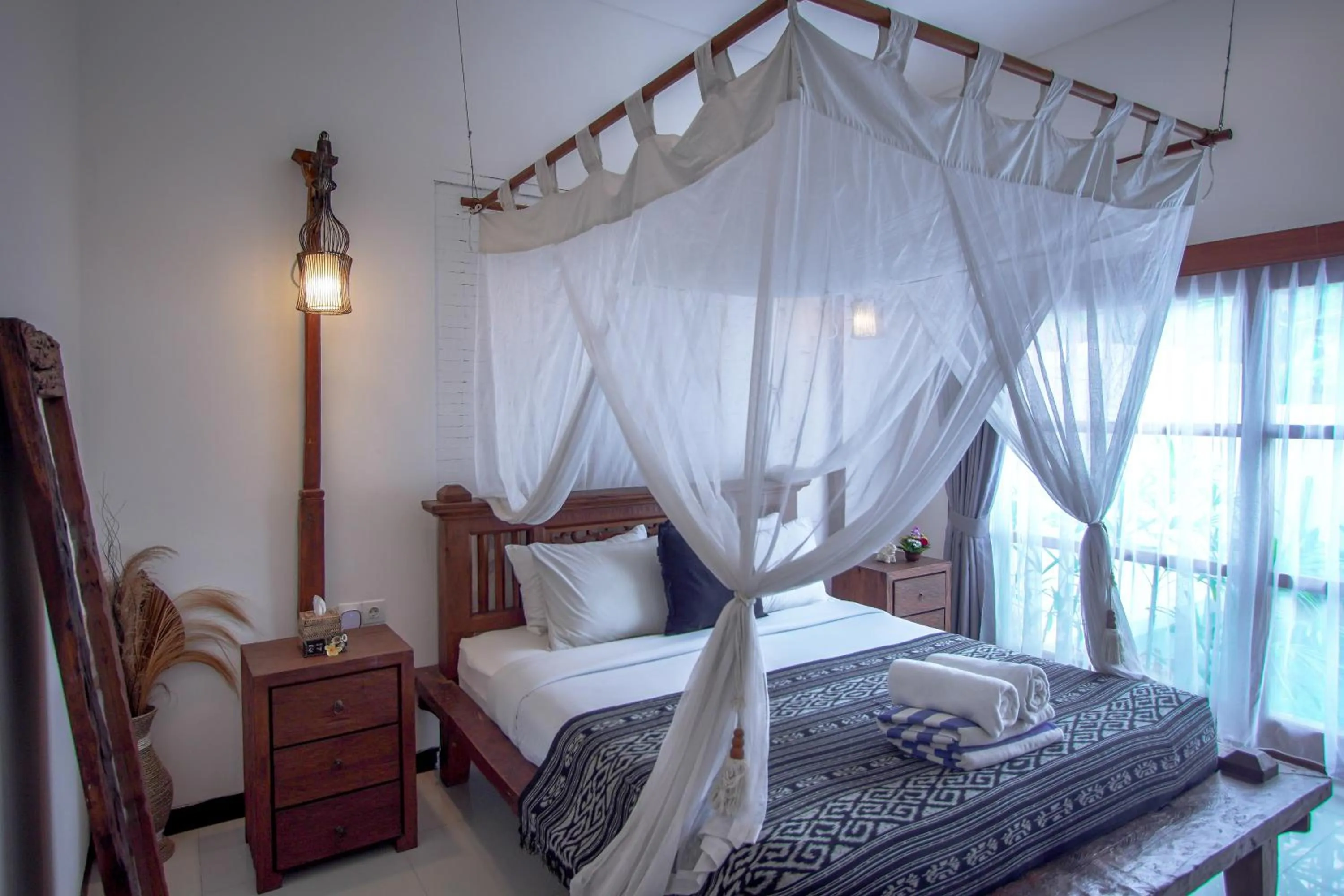 Bed in The Calmtree Bungalows