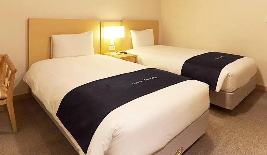 Bed in Towerhill Hotel