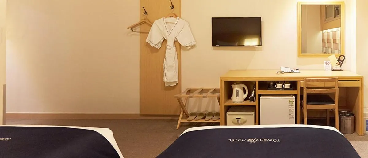 Bed in Towerhill Hotel