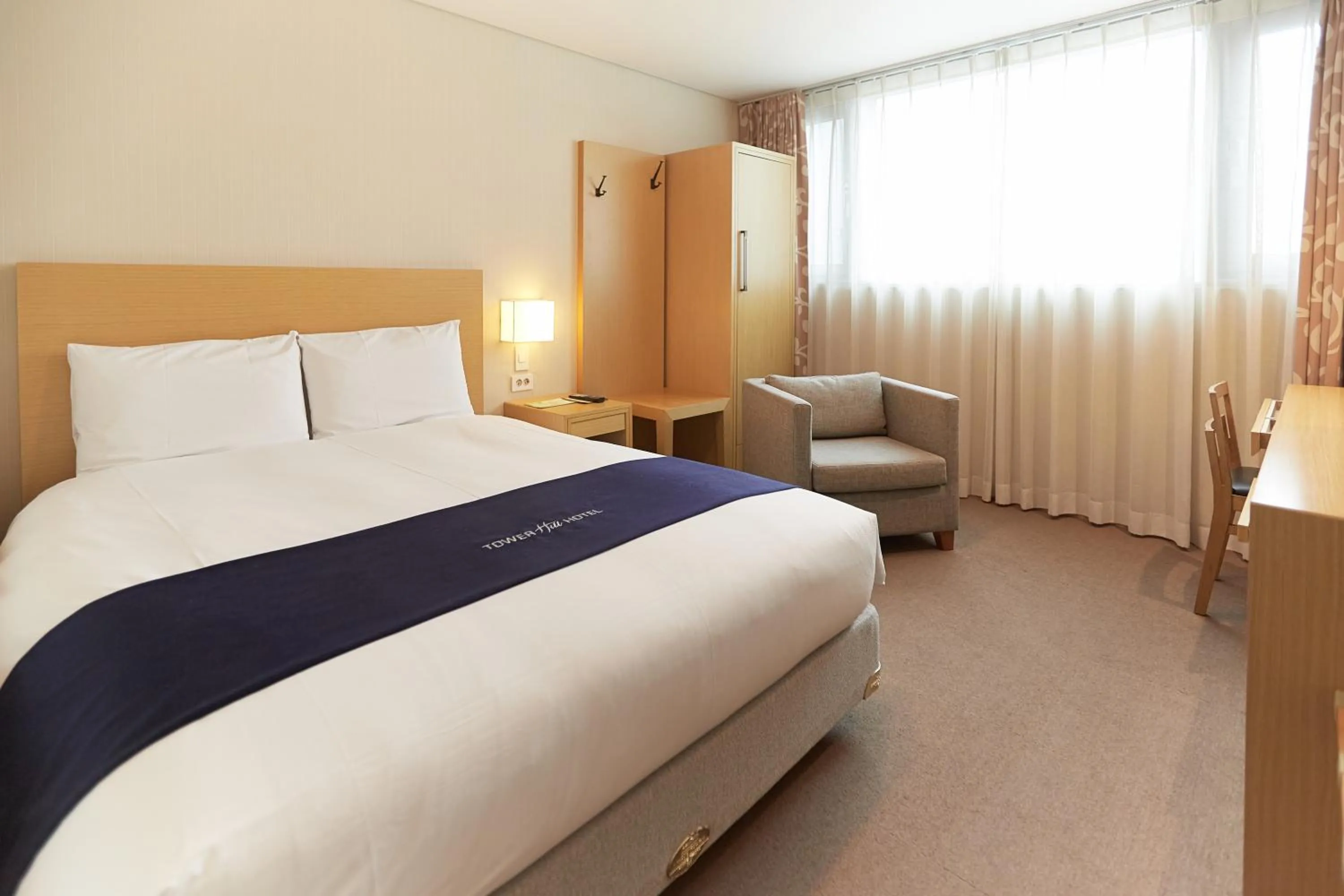 Bed in Towerhill Hotel