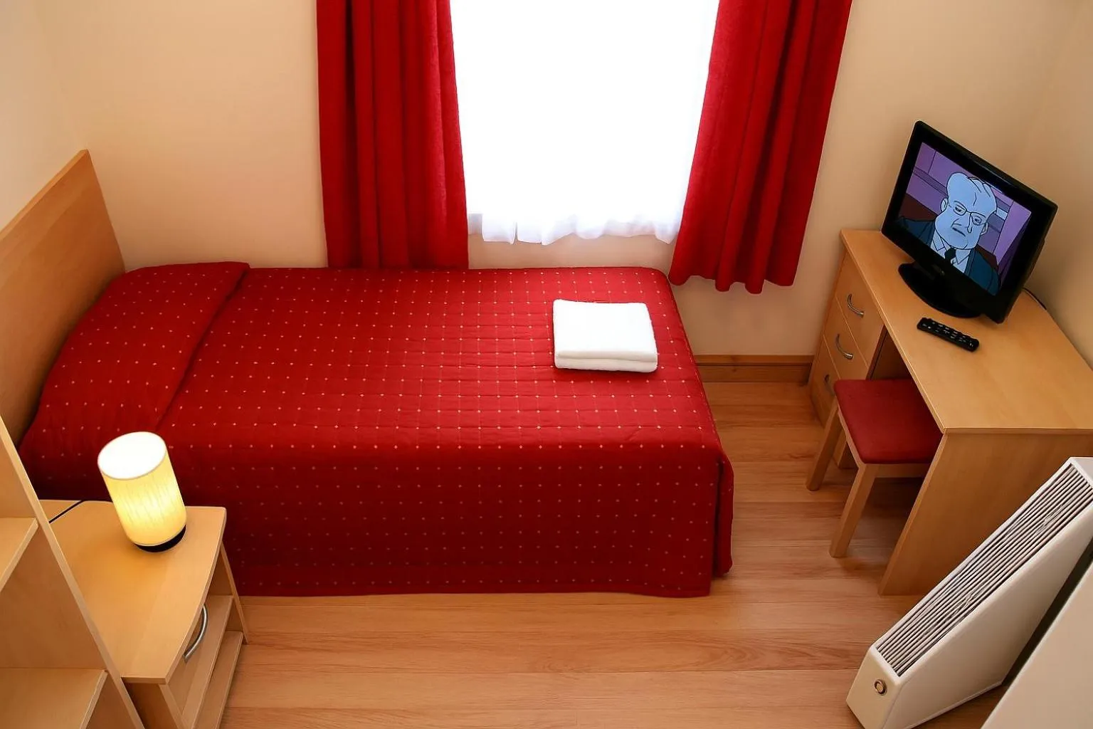 Bed in Elmwood Hotel