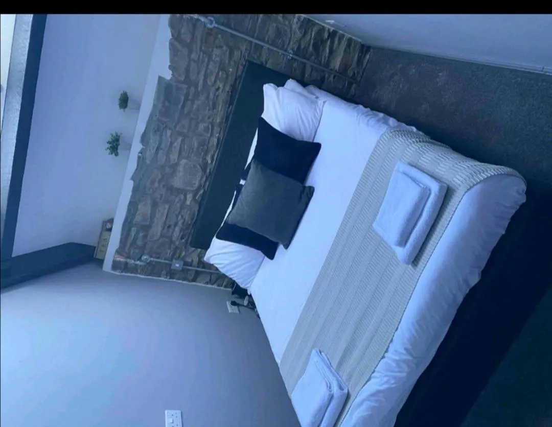 Bed in Sgwd Gwladys Lodge