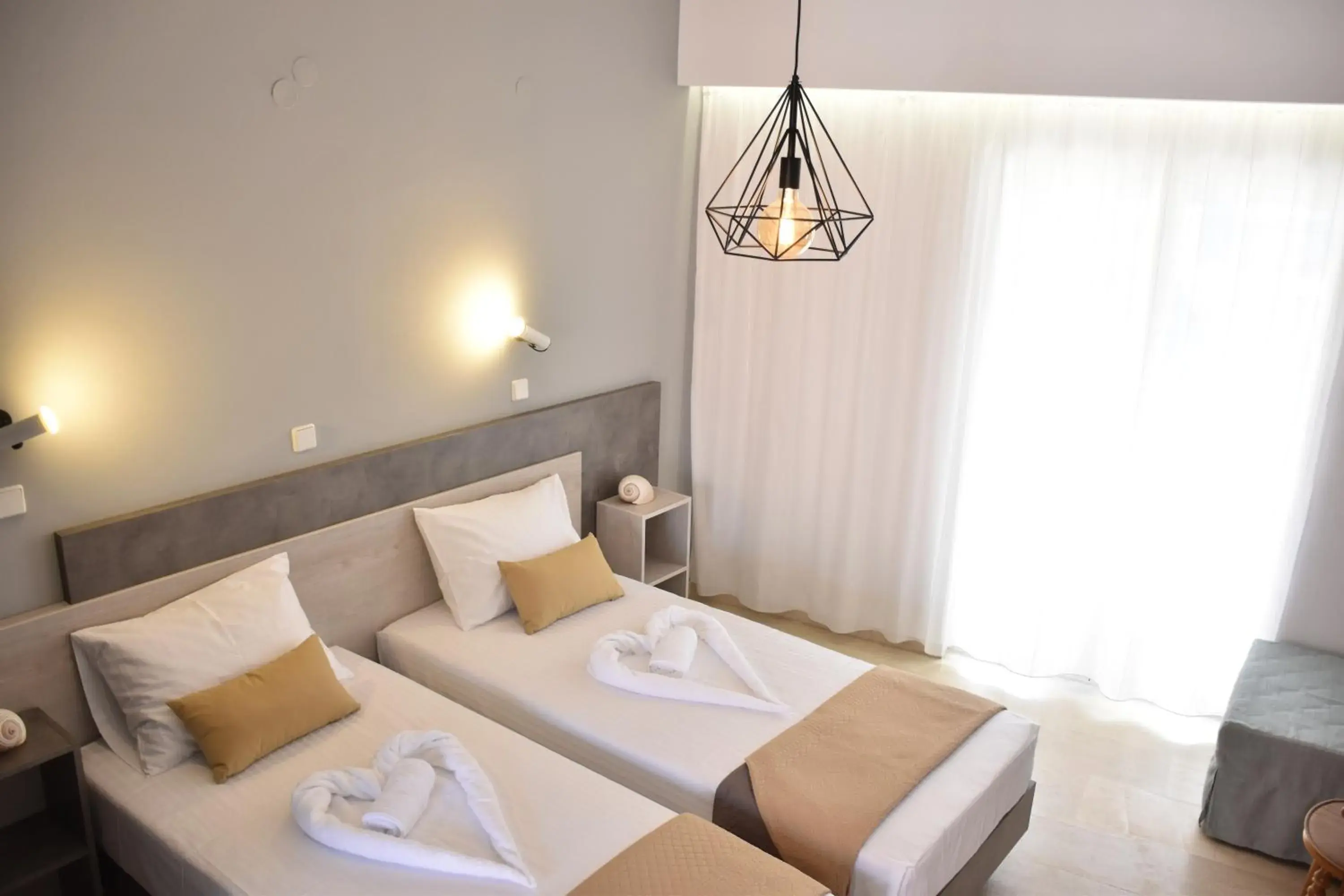 Standard Twin Room with Sofa in Ephelia gold Standard Twin Room with Sofa in Ephelia gold