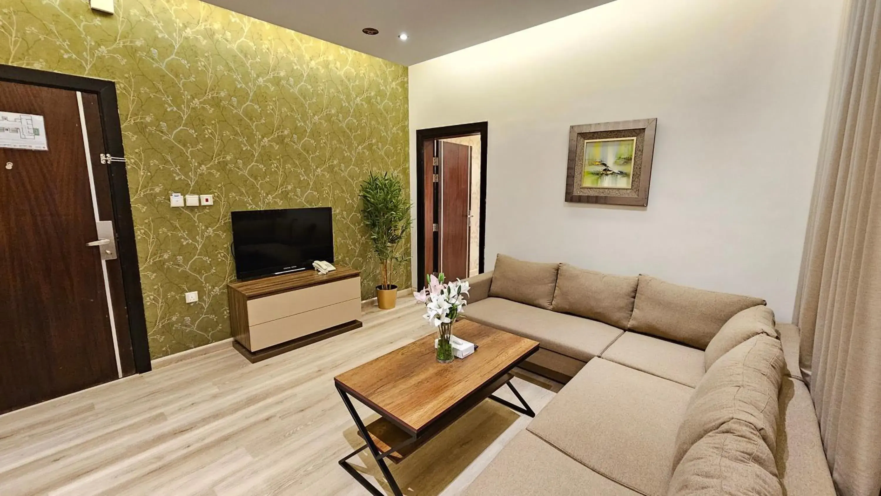 TV and multimedia in Rahhal AlBahr Serviced Apartments TV and multimedia in Rahhal AlBahr Serviced Apartments