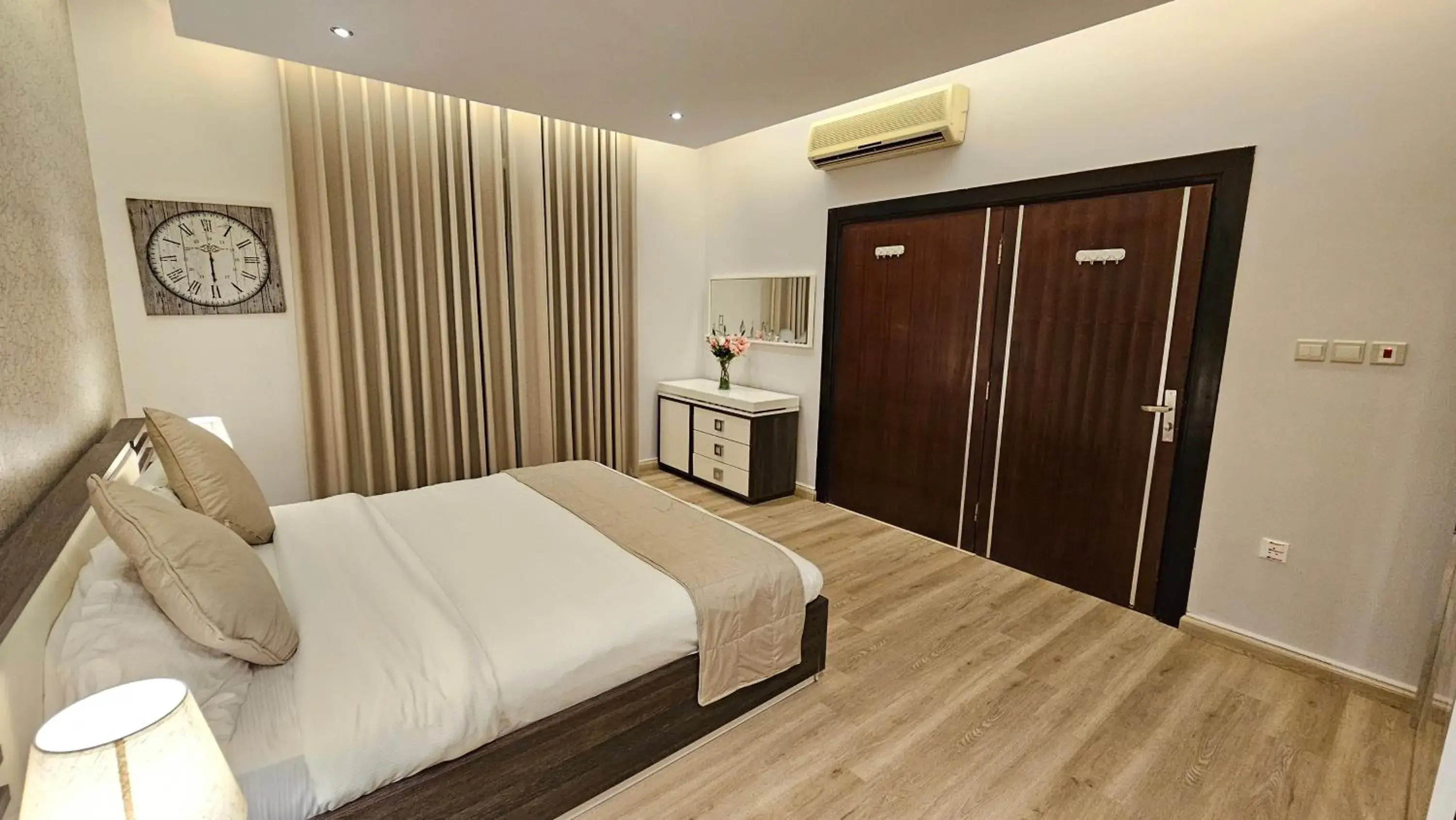 Bedroom, Bed in Rahhal AlBahr Serviced Apartments Bedroom, Bed in Rahhal AlBahr Serviced Apartments