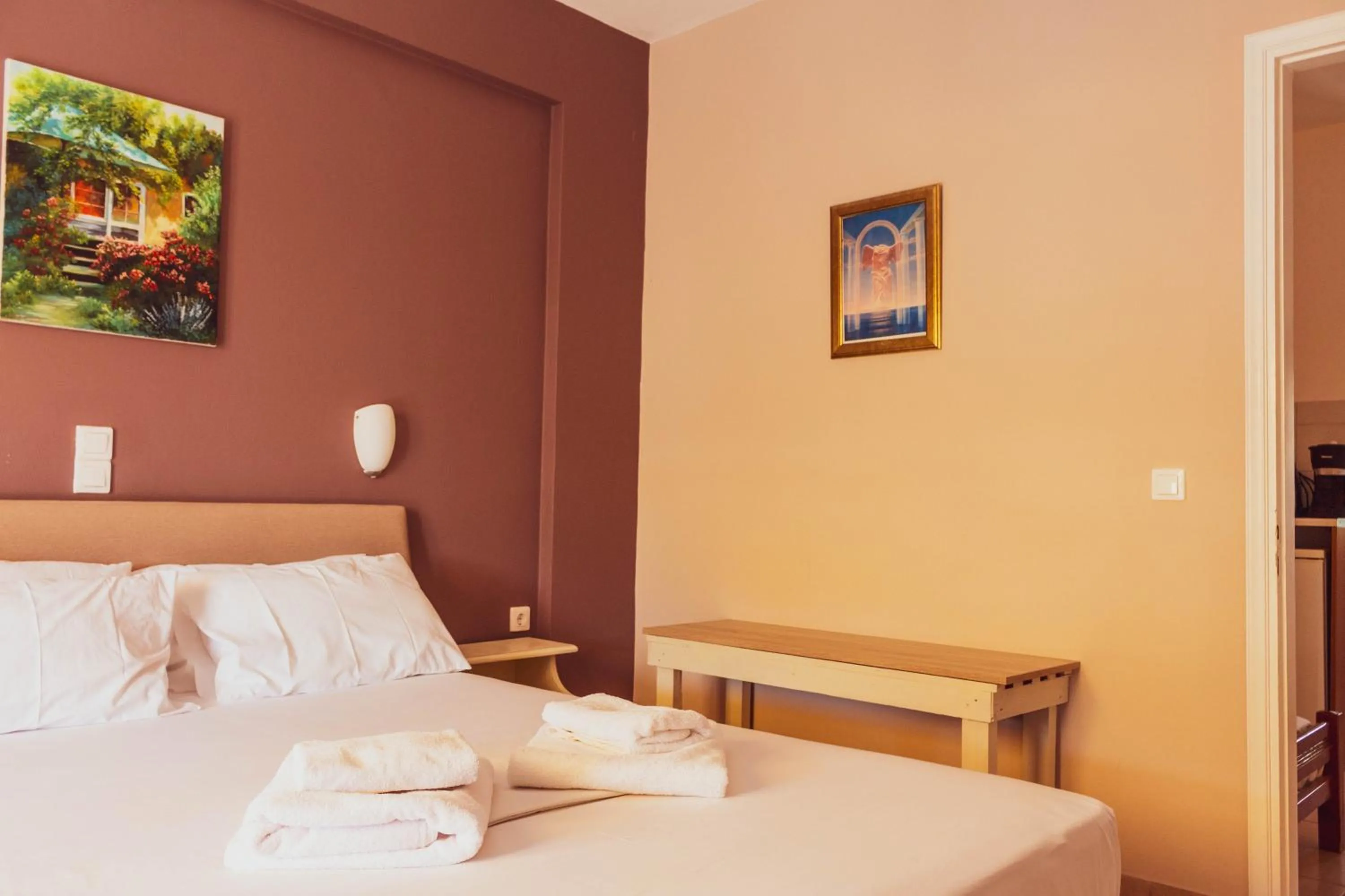 Bed in Apagio Apartments