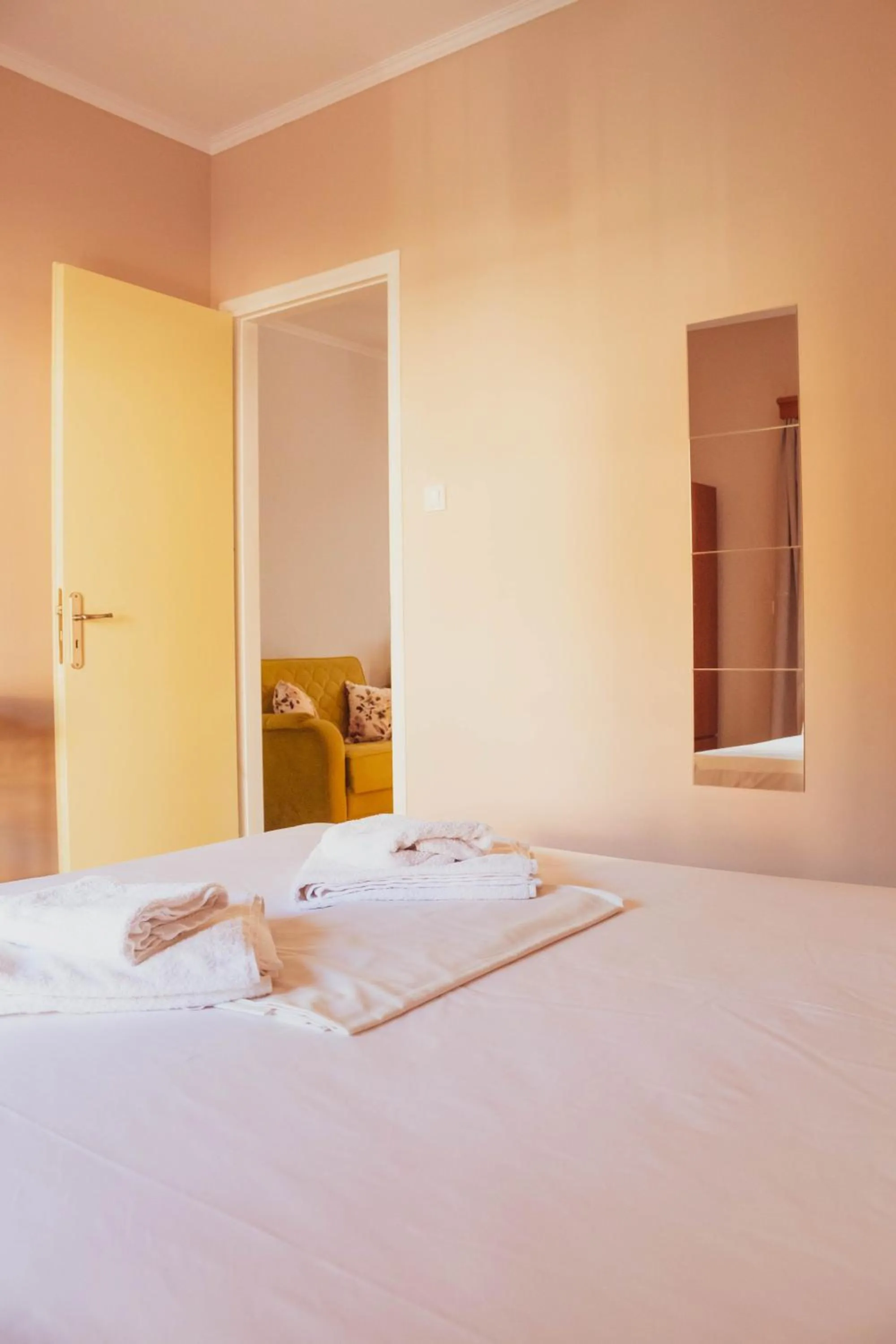 Bed in Apagio Apartments