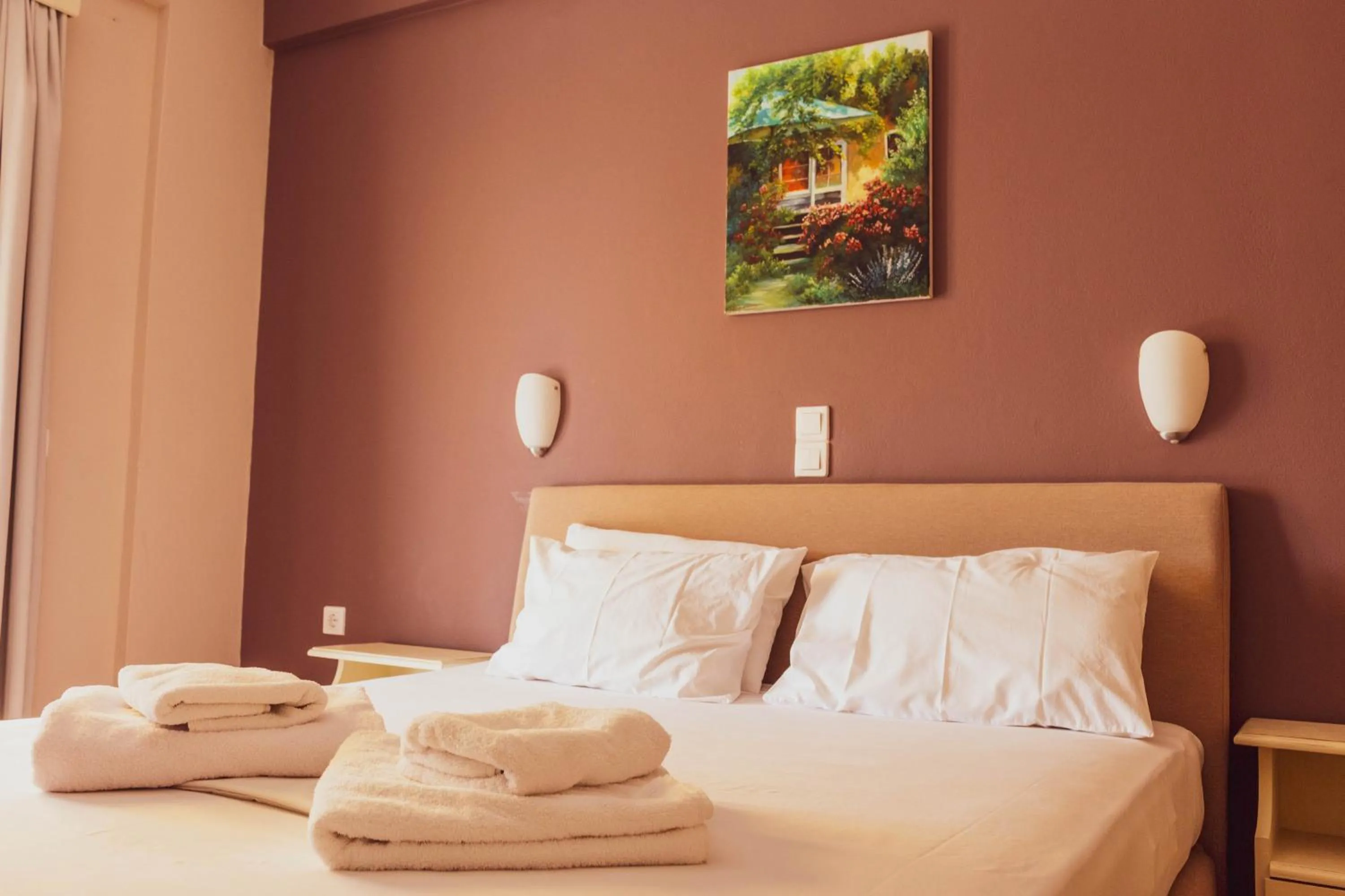 Bed in Apagio Apartments