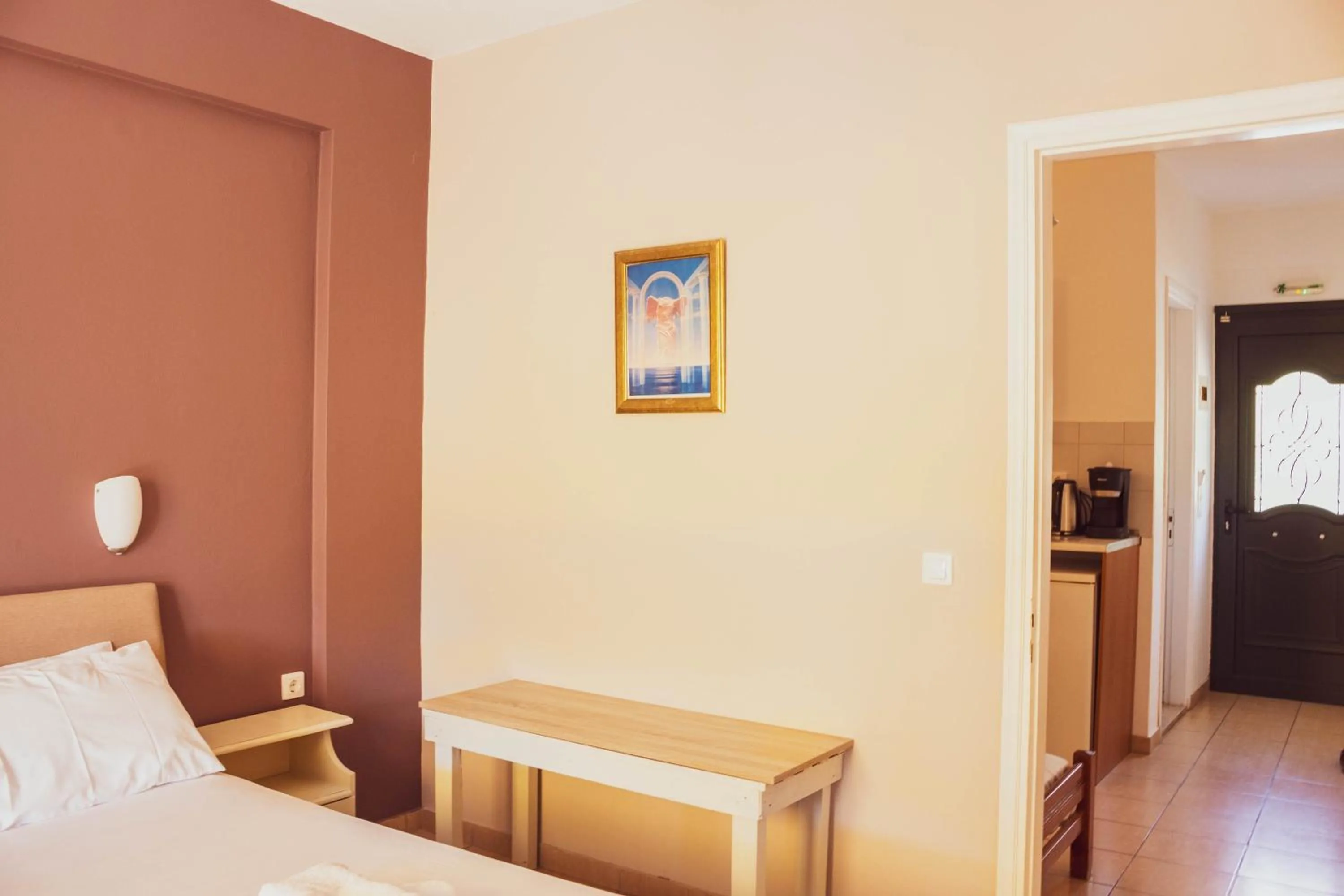 Bed in Apagio Apartments