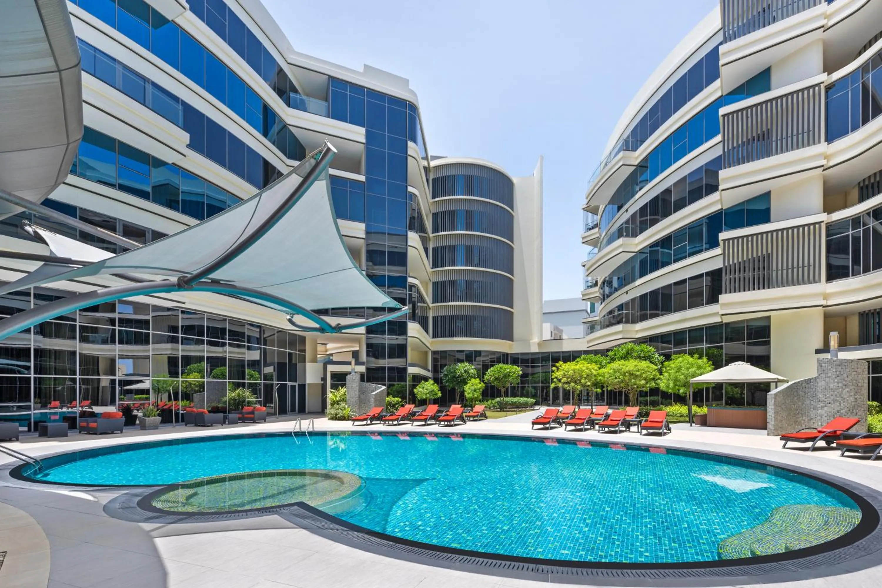 Swimming pool in Majestic Arjaan by Rotana – Manama