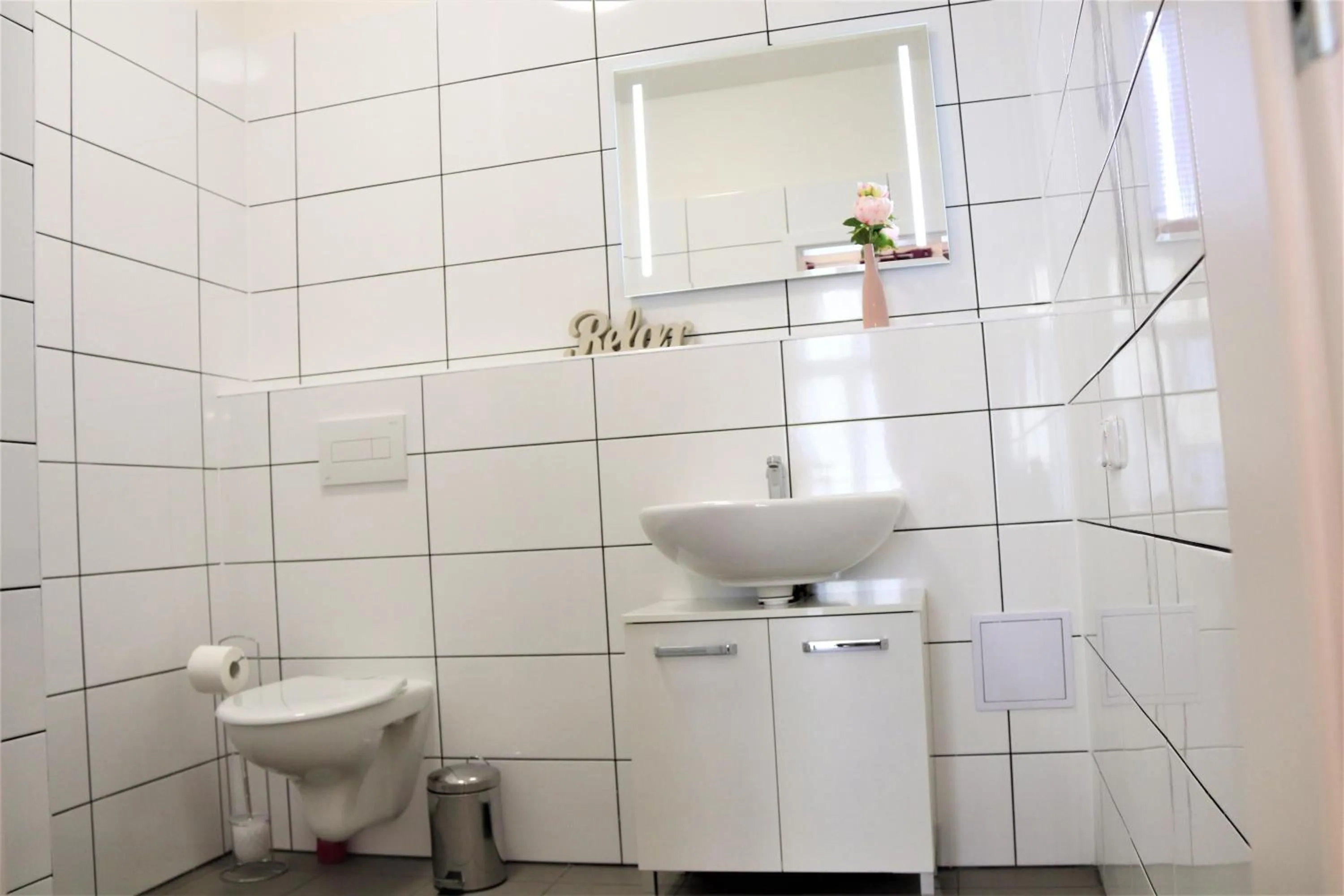 Bathroom in Flowers apartments