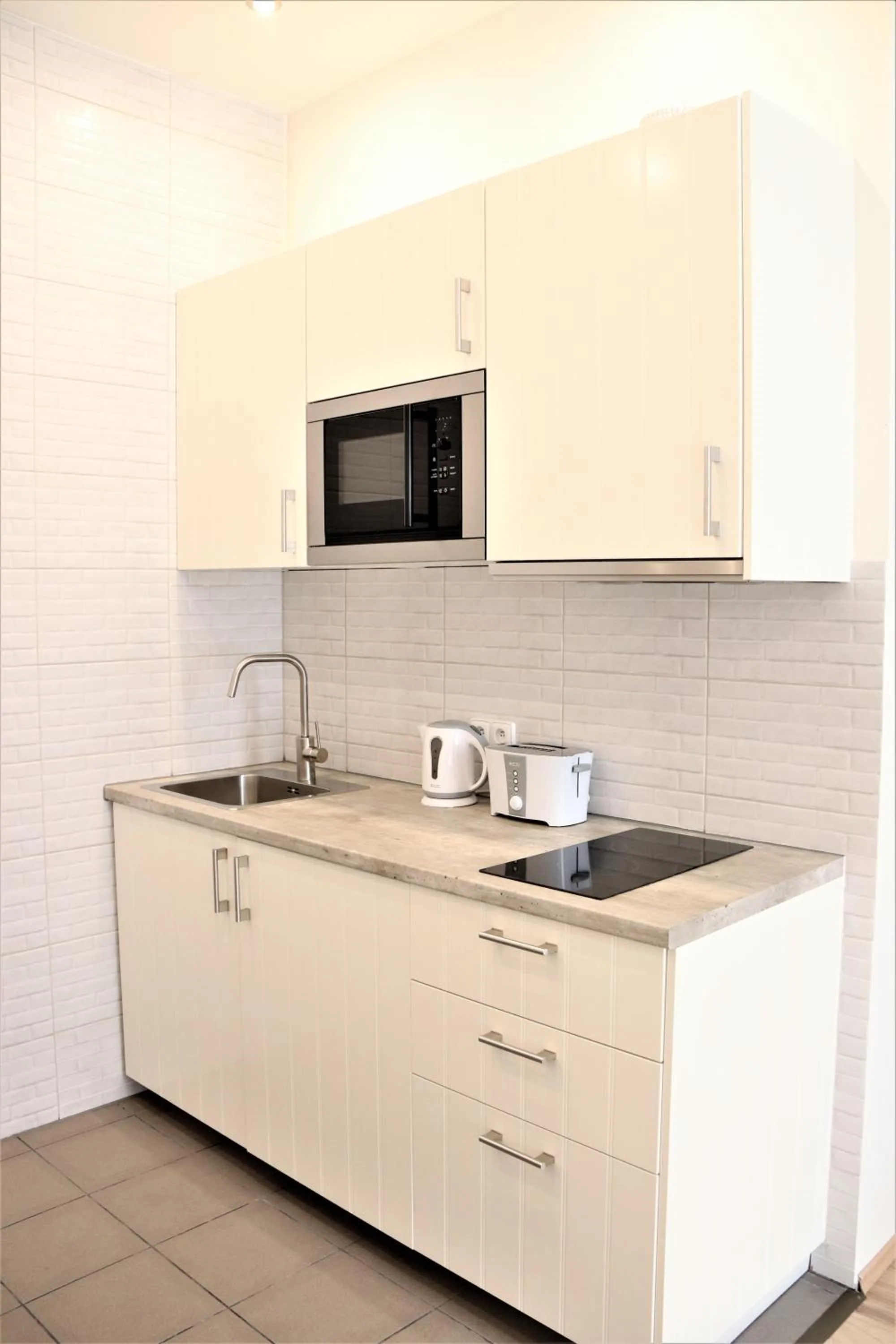 Kitchen or kitchenette in Flowers apartments