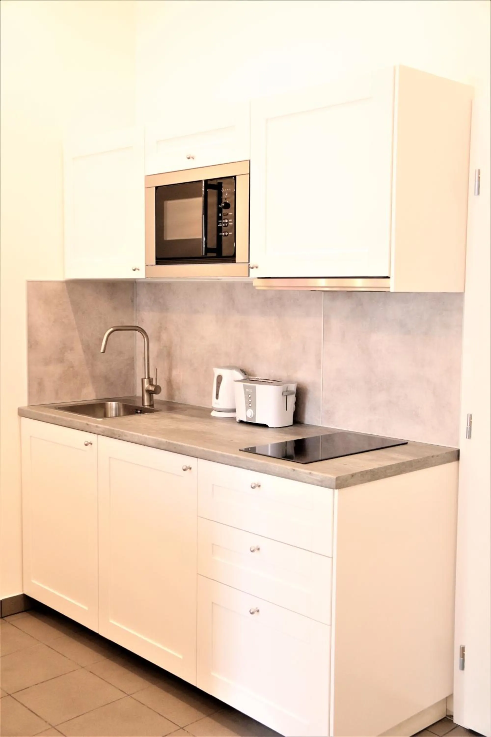 Kitchen or kitchenette in Flowers apartments