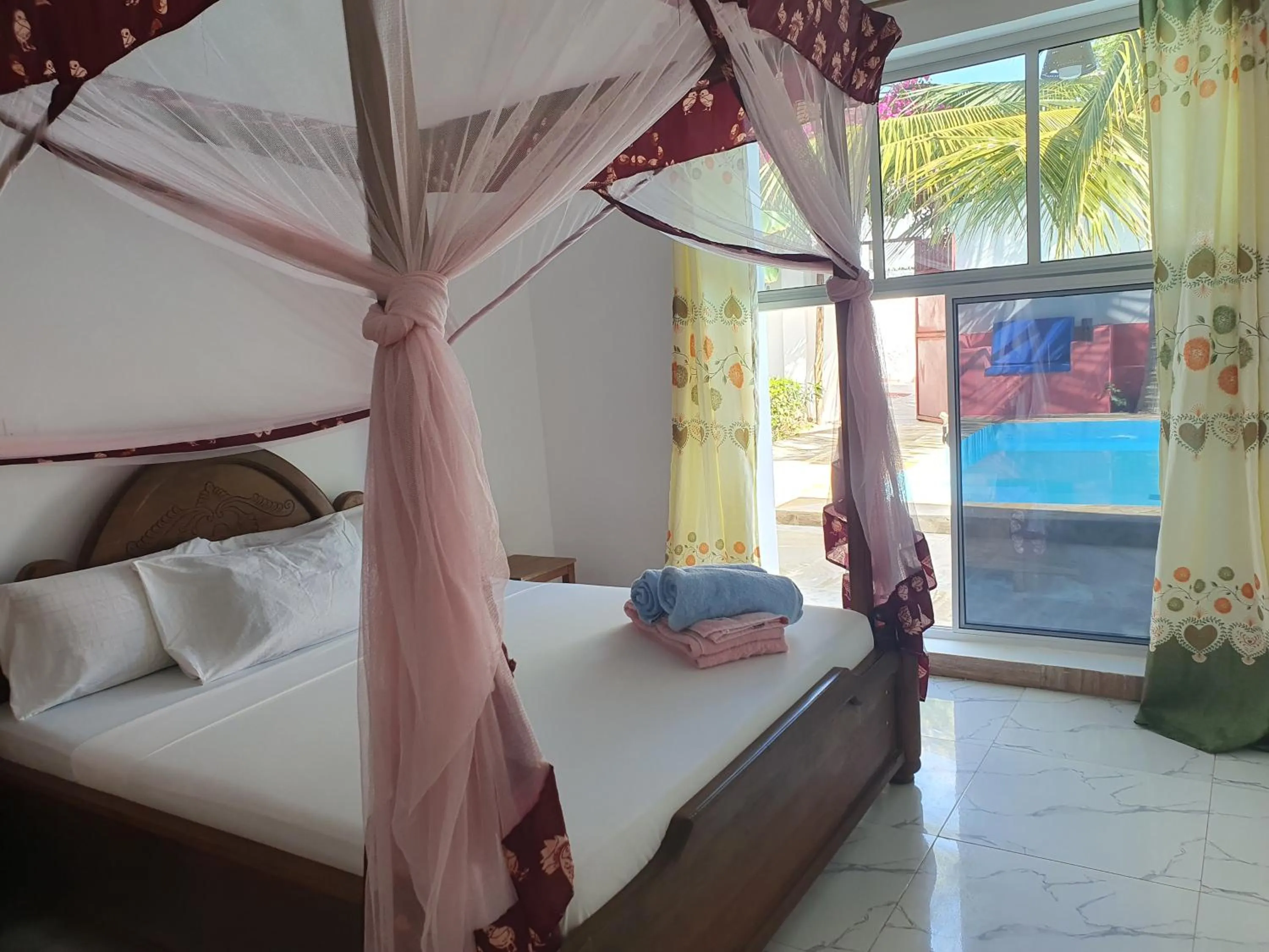 Bed in BARIDI VILLA