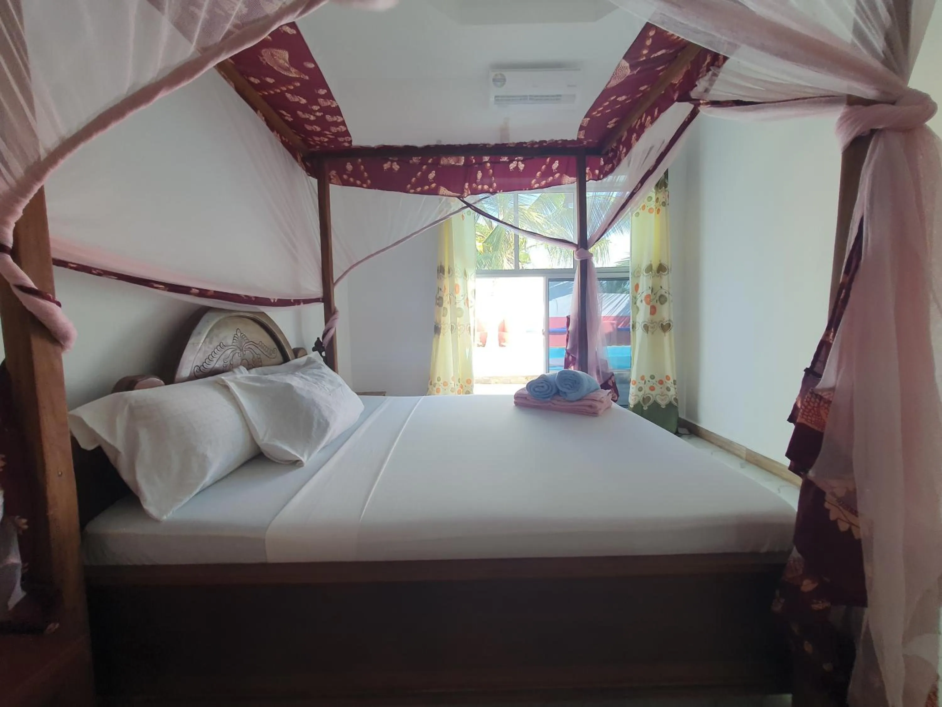 Bed in BARIDI VILLA