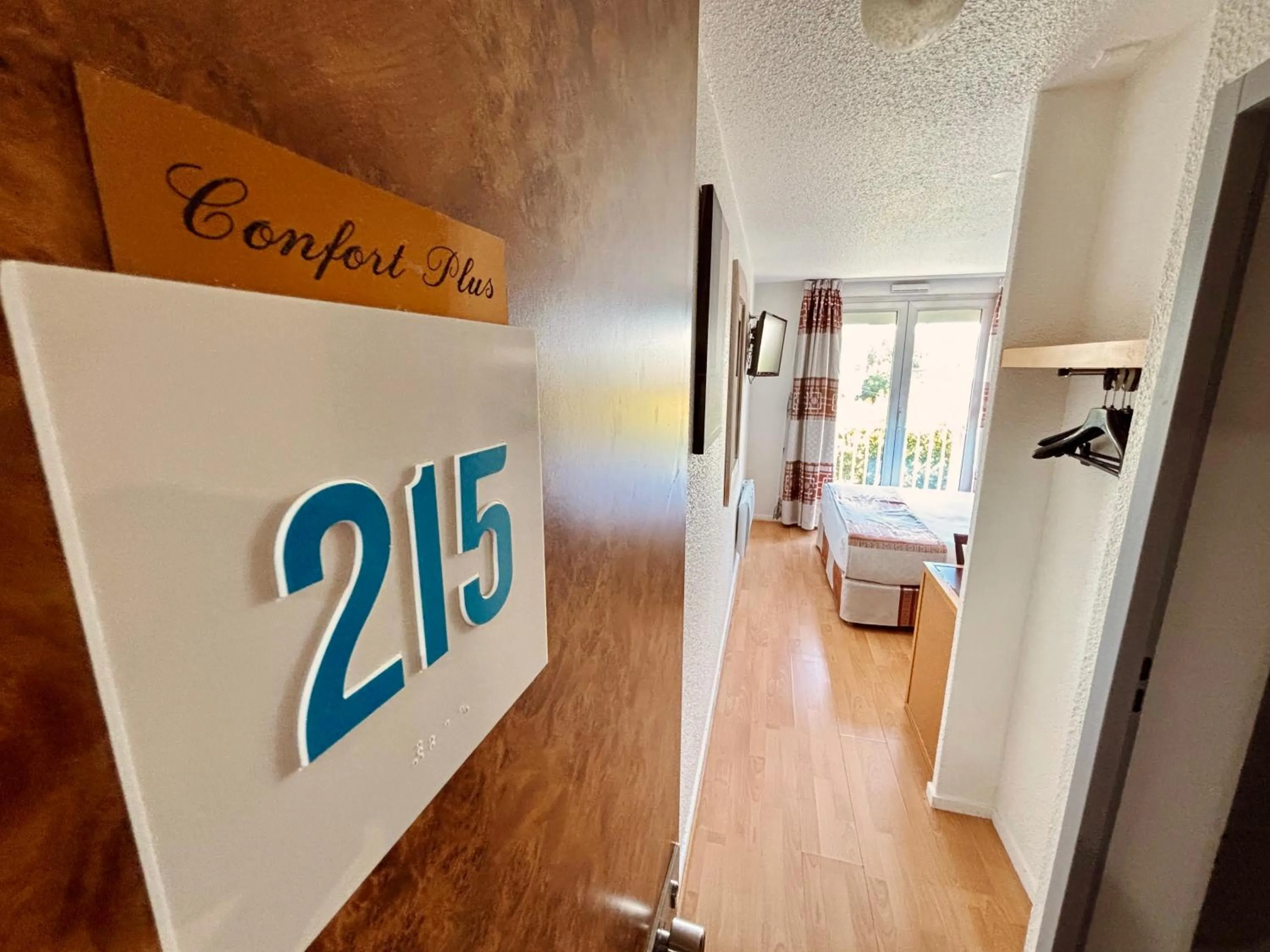 Bedroom in Kyriad Direct Arpajon