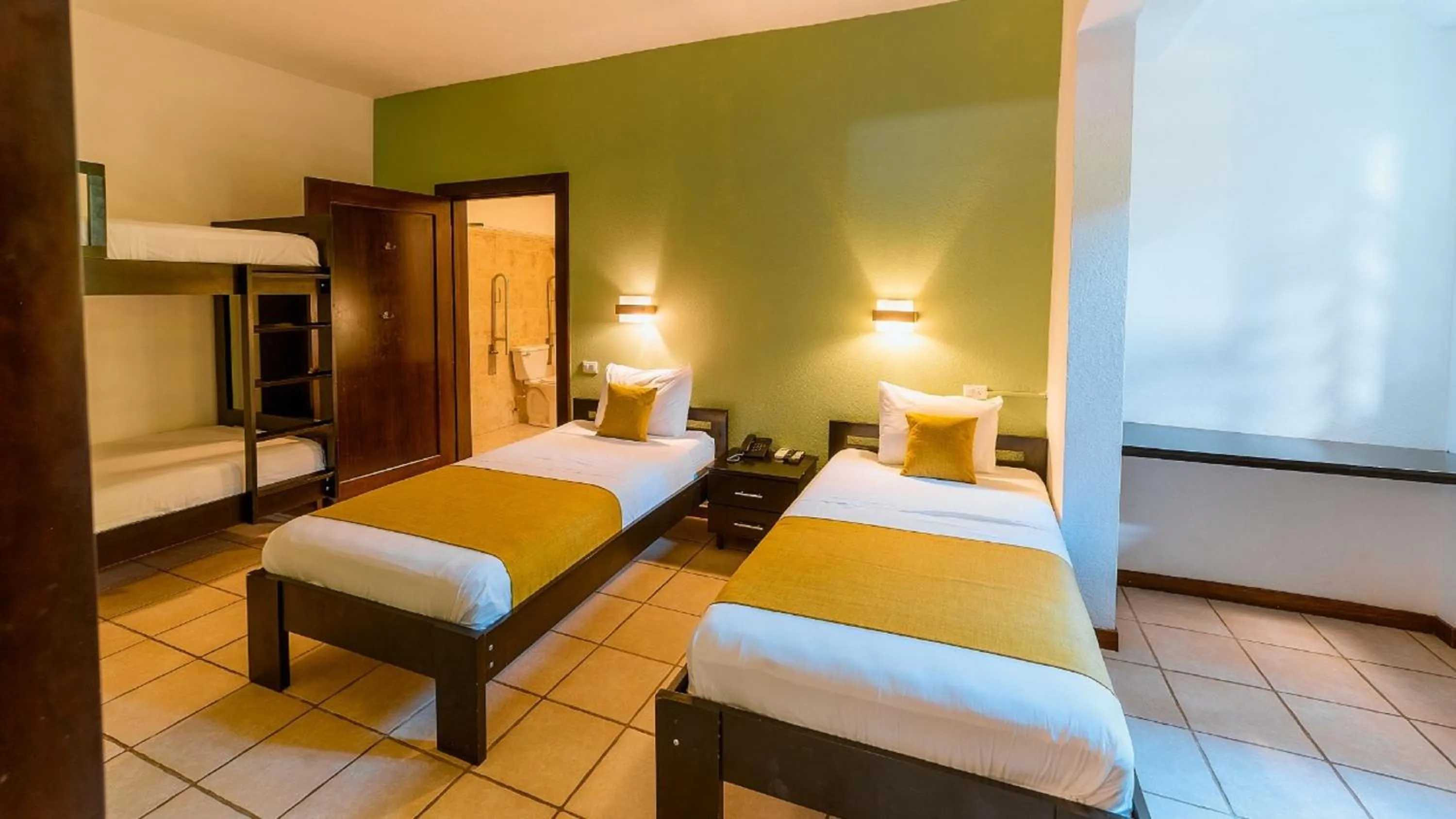 Bed in Terrazas del Caribe Hotel