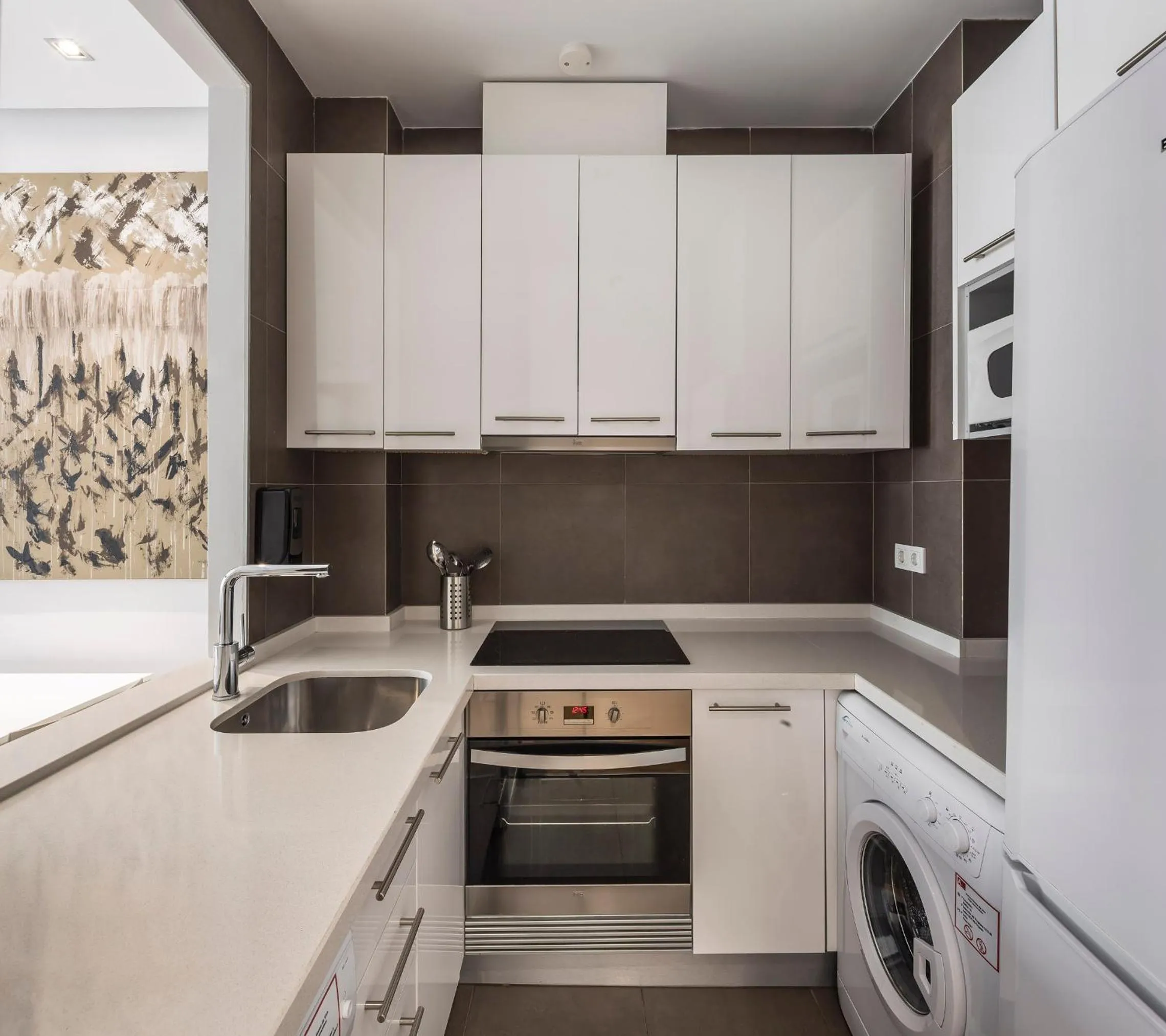 Kitchen or kitchenette in Mon Suites Catedral