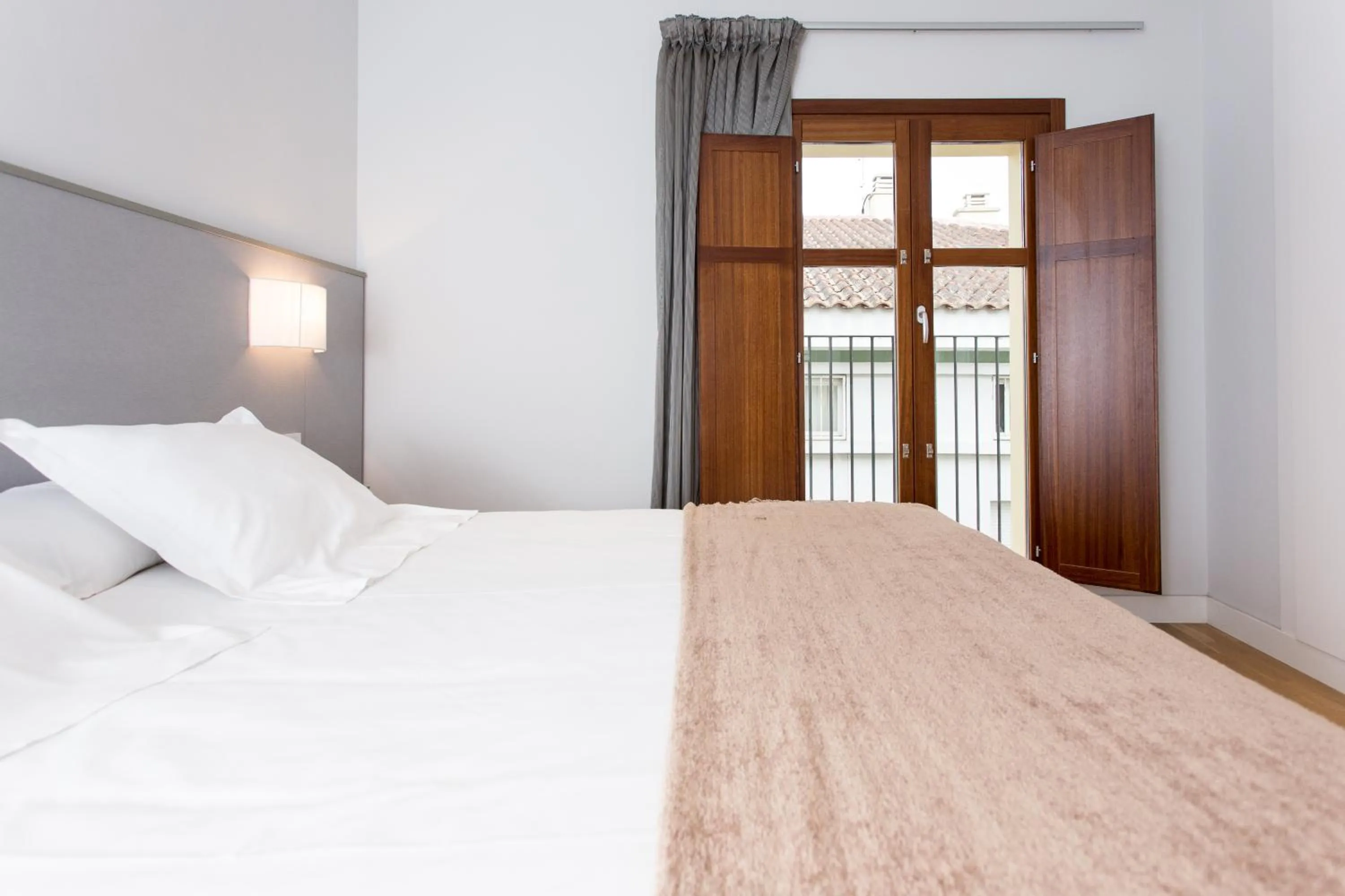 Bed in Mon Suites Catedral