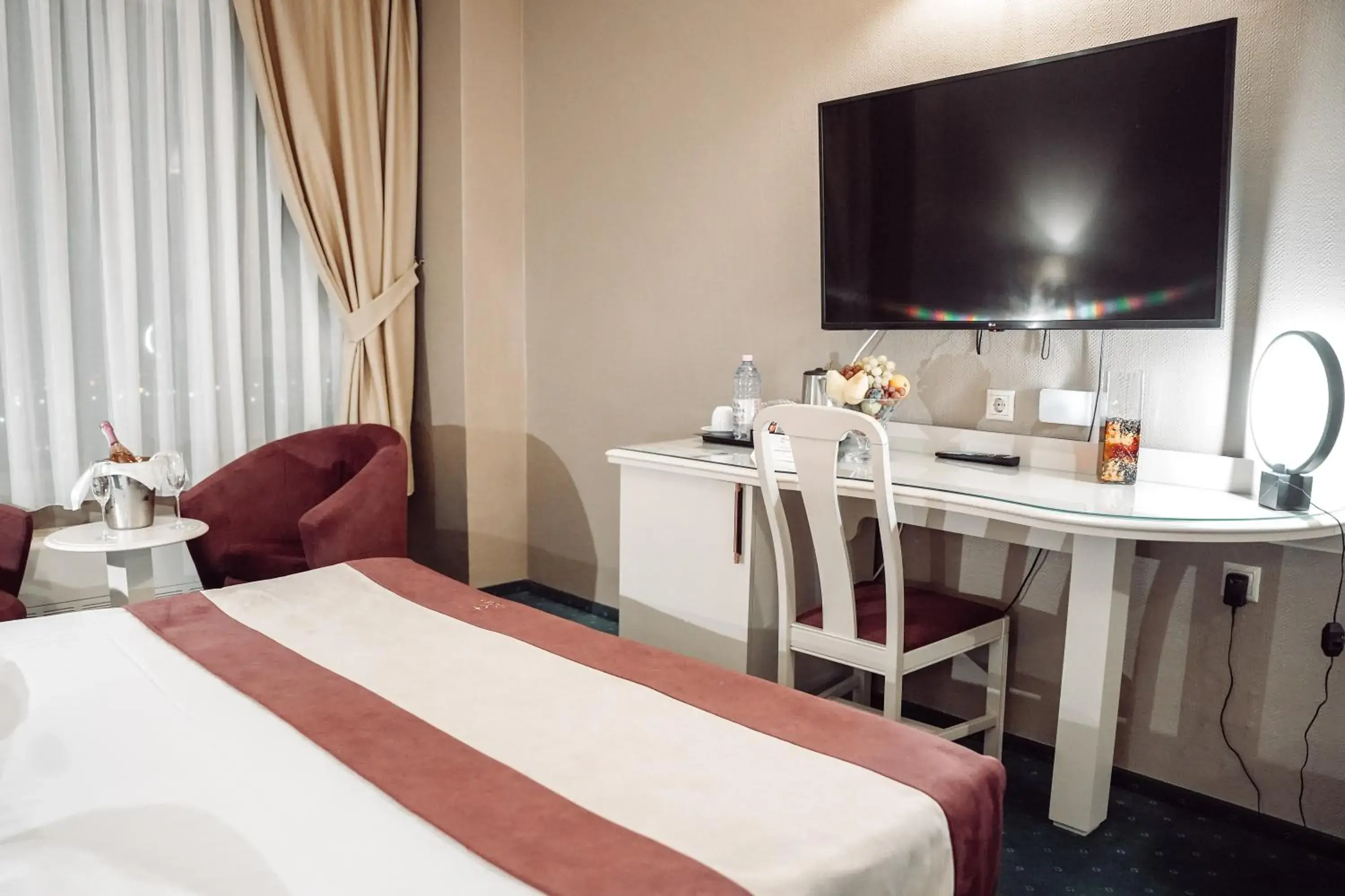 Seating area, Bed in Unirea Hotel & Spa Seating area, Bed in Unirea Hotel & Spa