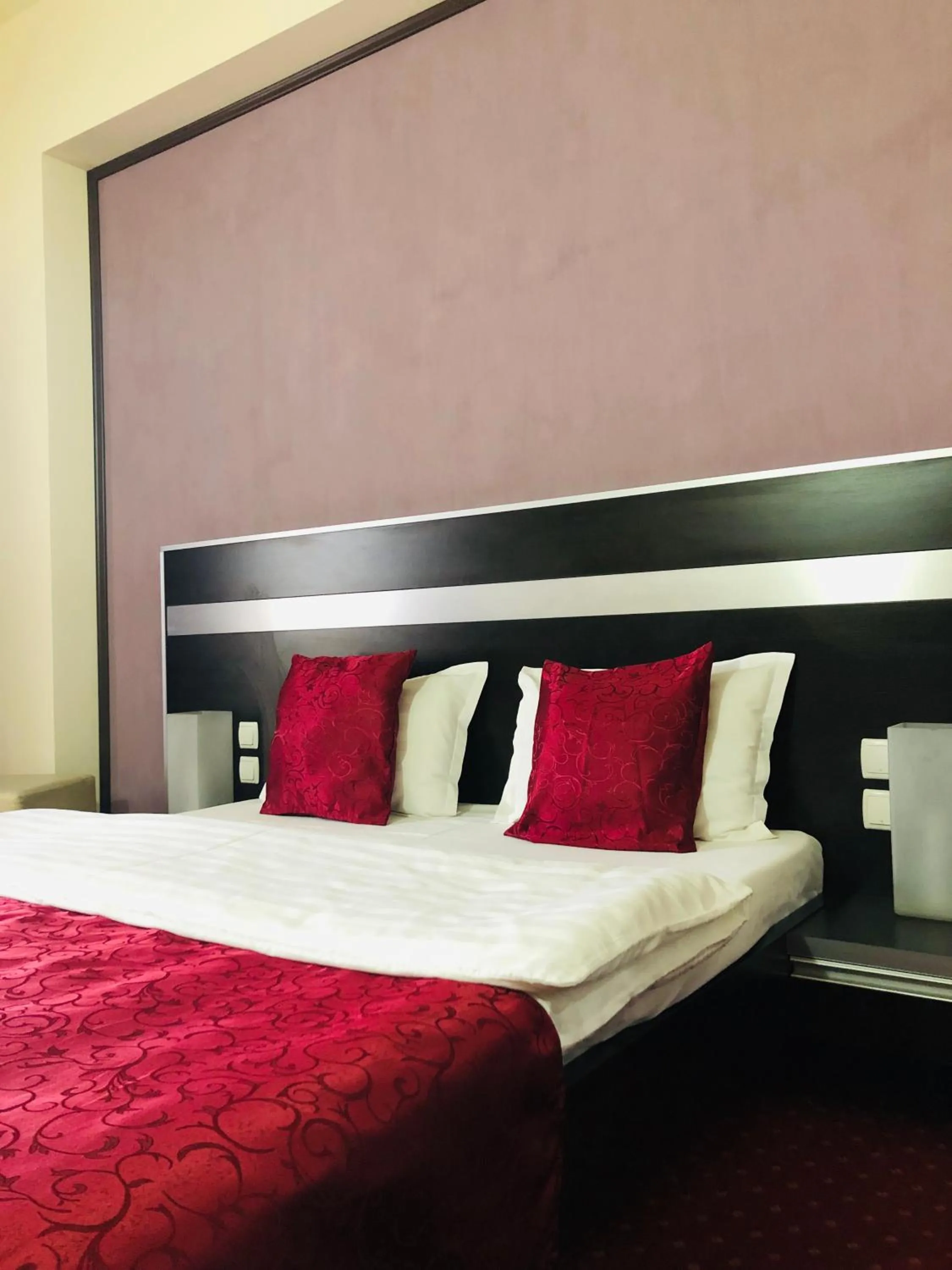 Bed in Hotel Angellis