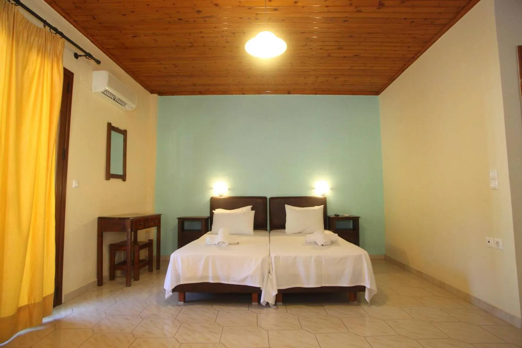 Bed in Vicky Apartments