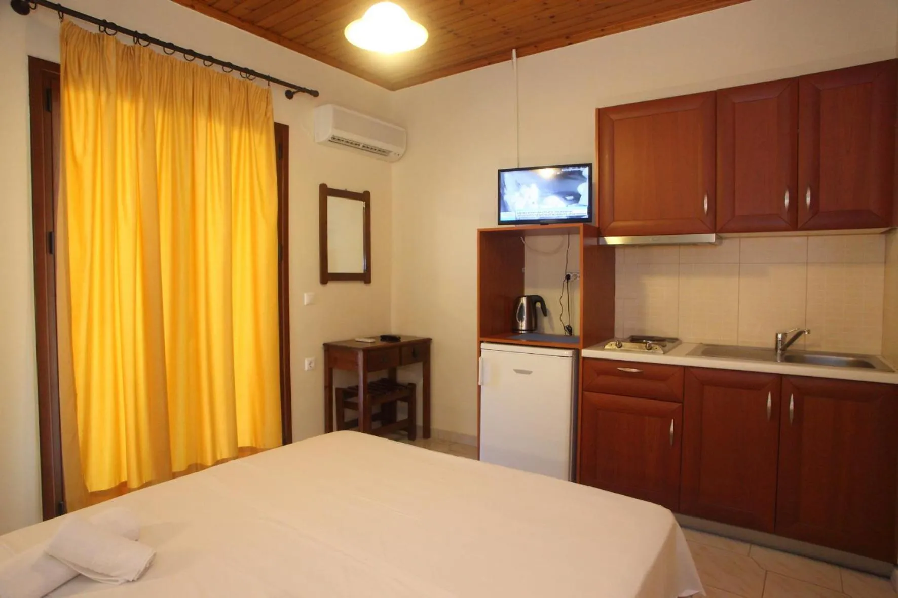 Bed in Vicky Apartments