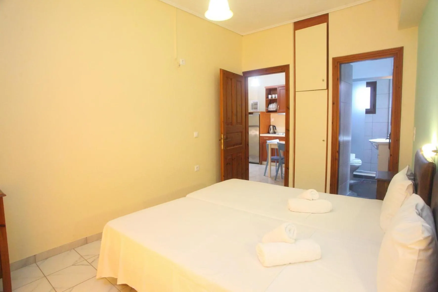 Bed in Vicky Apartments
