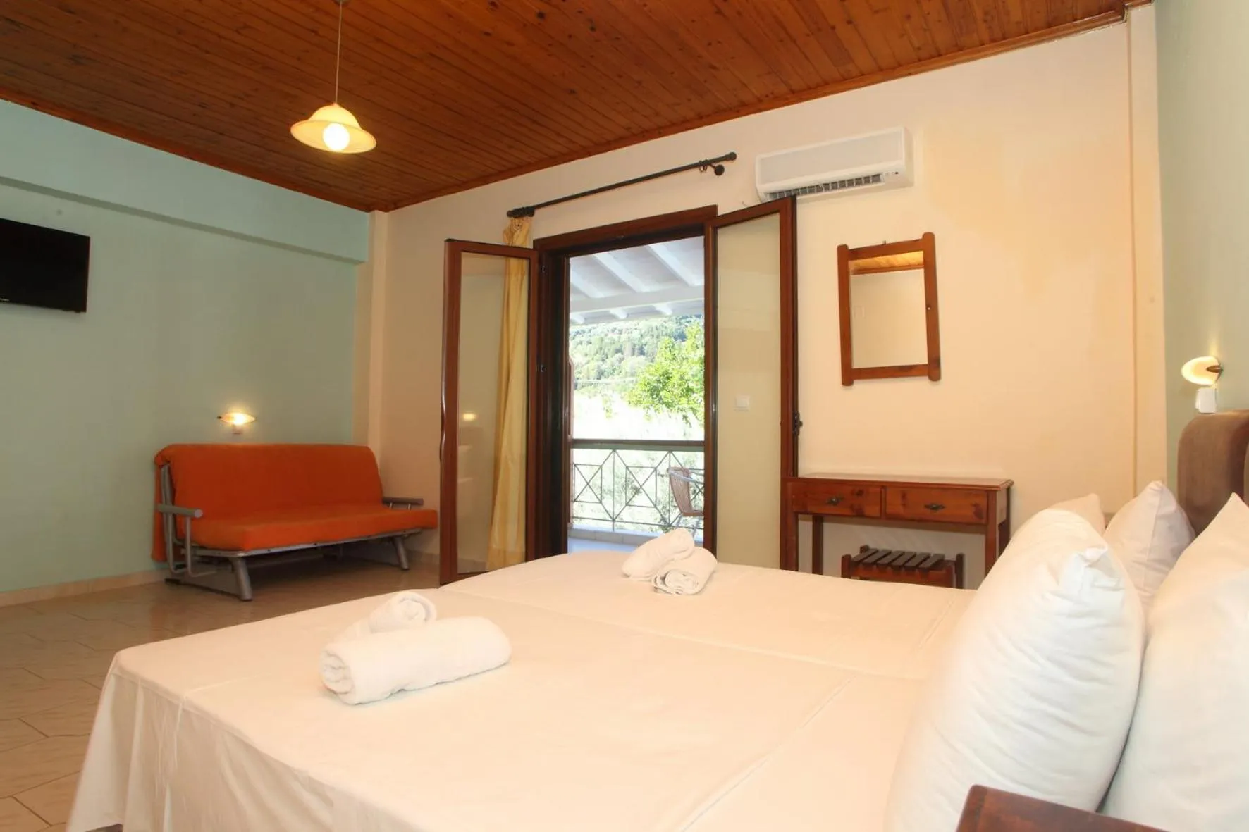 Bed in Vicky Apartments