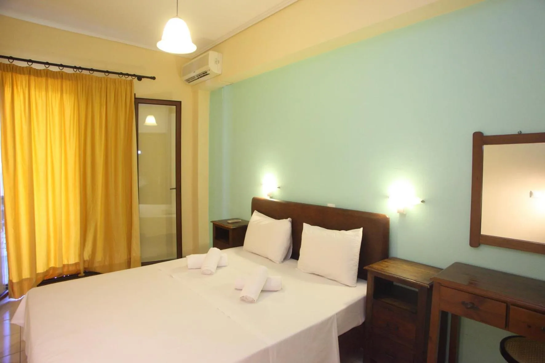 Bed in Vicky Apartments