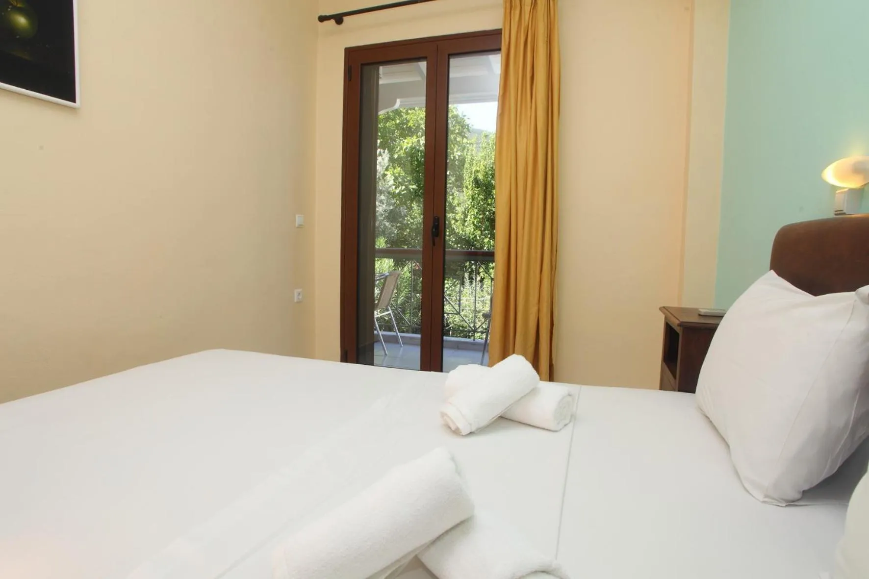 Bed in Vicky Apartments