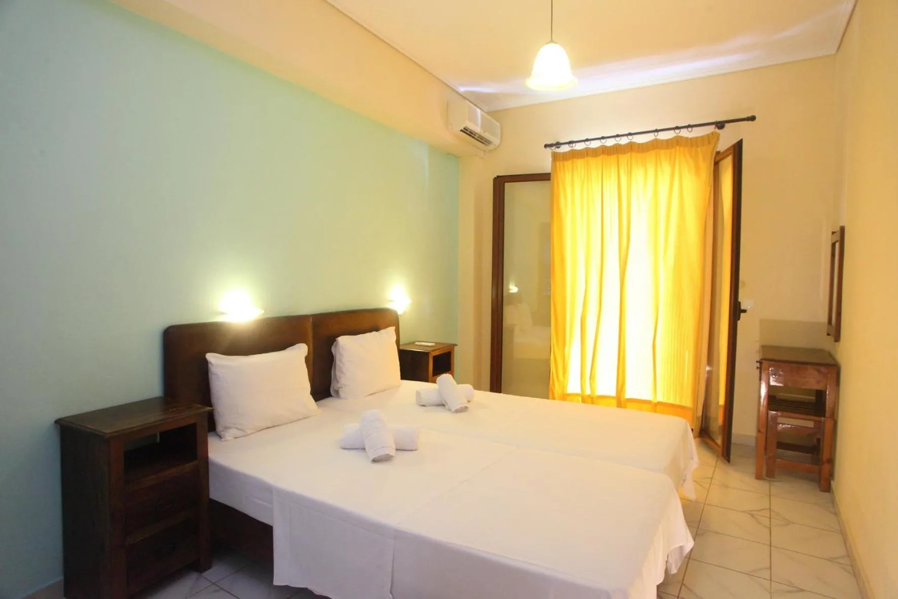 Bed in Vicky Apartments