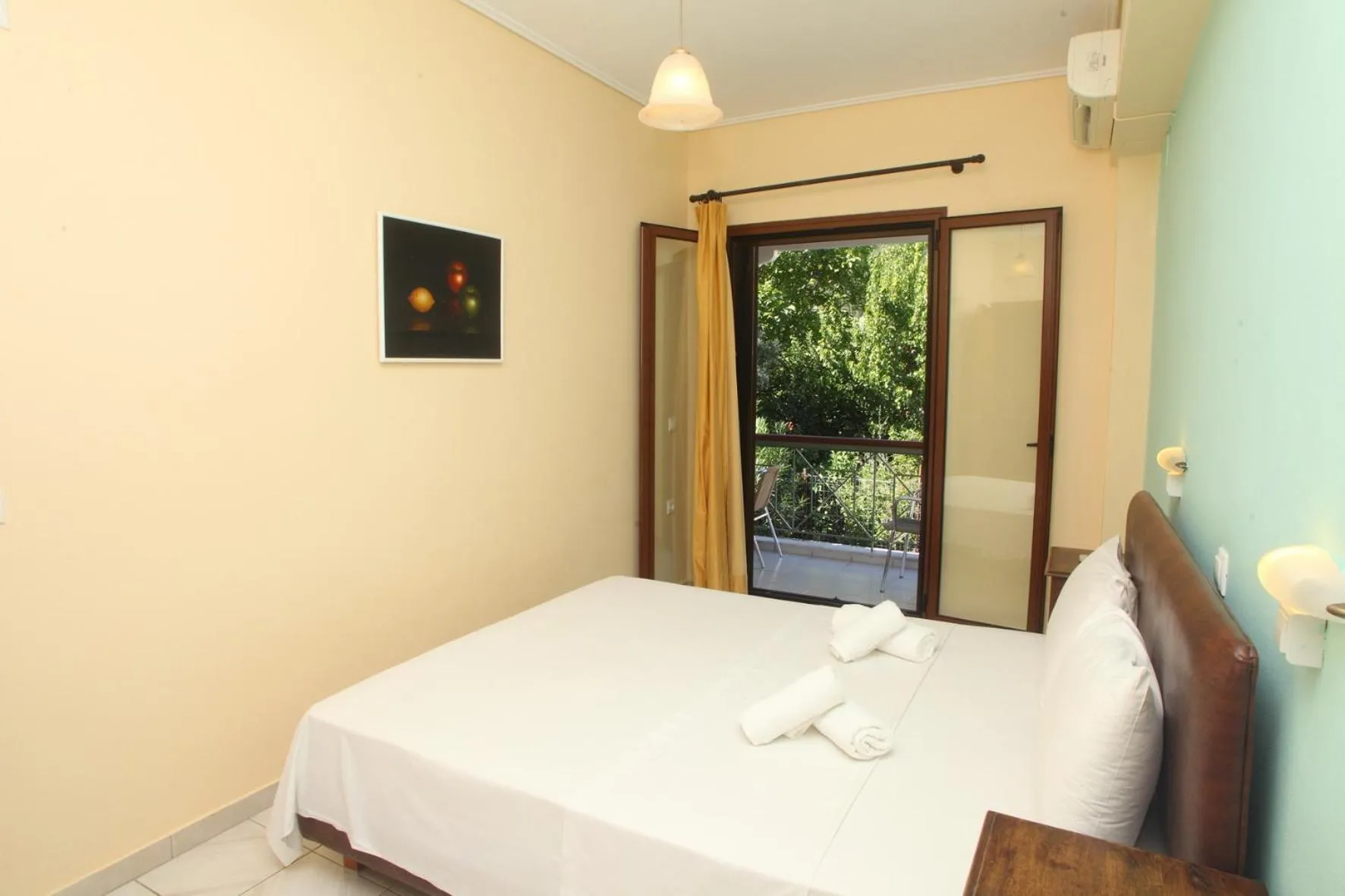 Bed in Vicky Apartments
